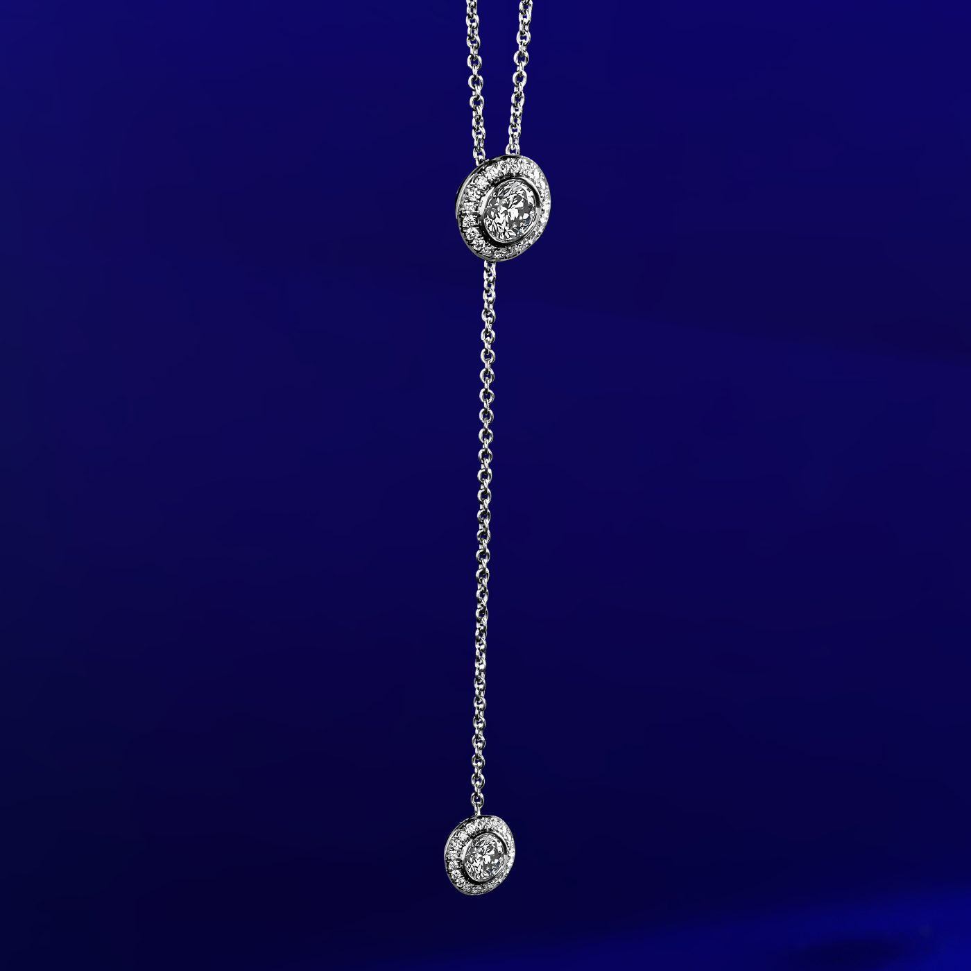 Royal Harmony Lariat Pendant With 2 Diamonds set pave all around designed by carati jewelry in montreal canada 14 k 18k in zoom and blue backround