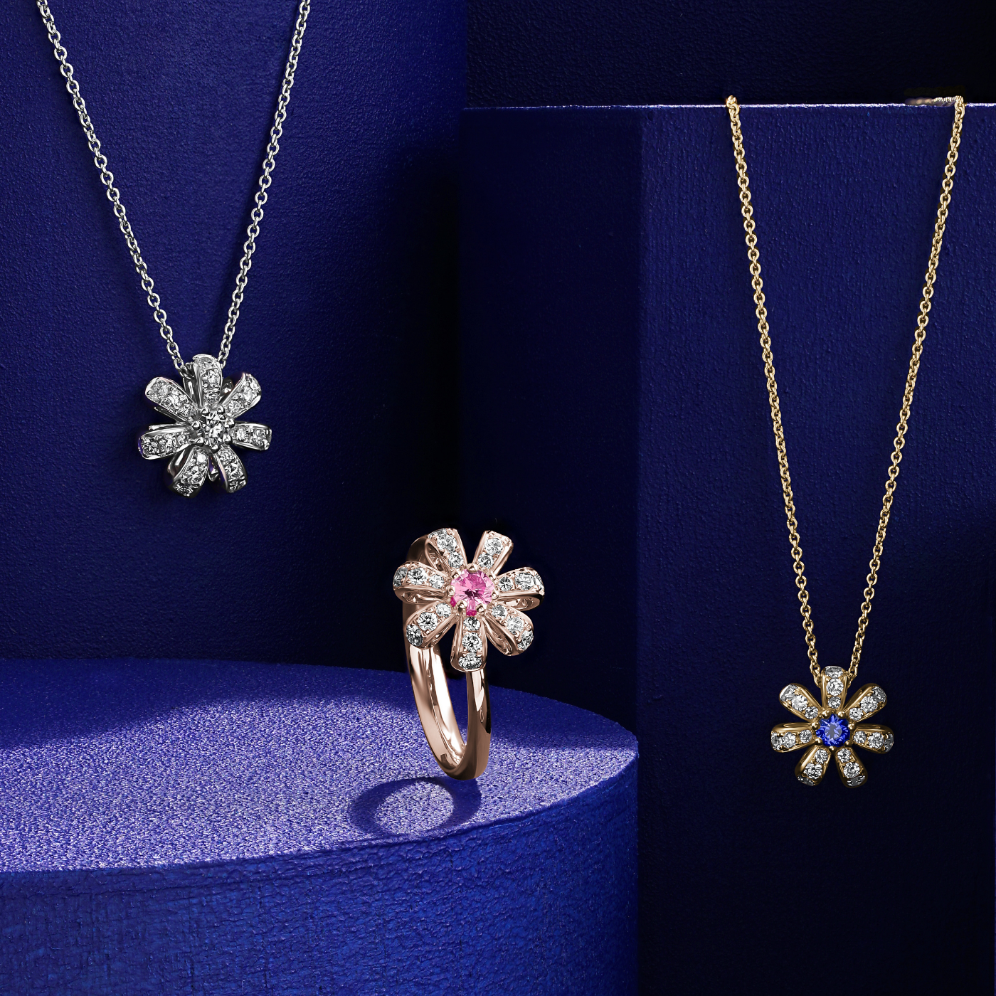 Fiora pendant set in pave Diamonds and a Sparkling blue Sapphire in the middle is iconic design from carati jewelry in montreal canada in 1k 14 kwith the pink ring and diamond pendant