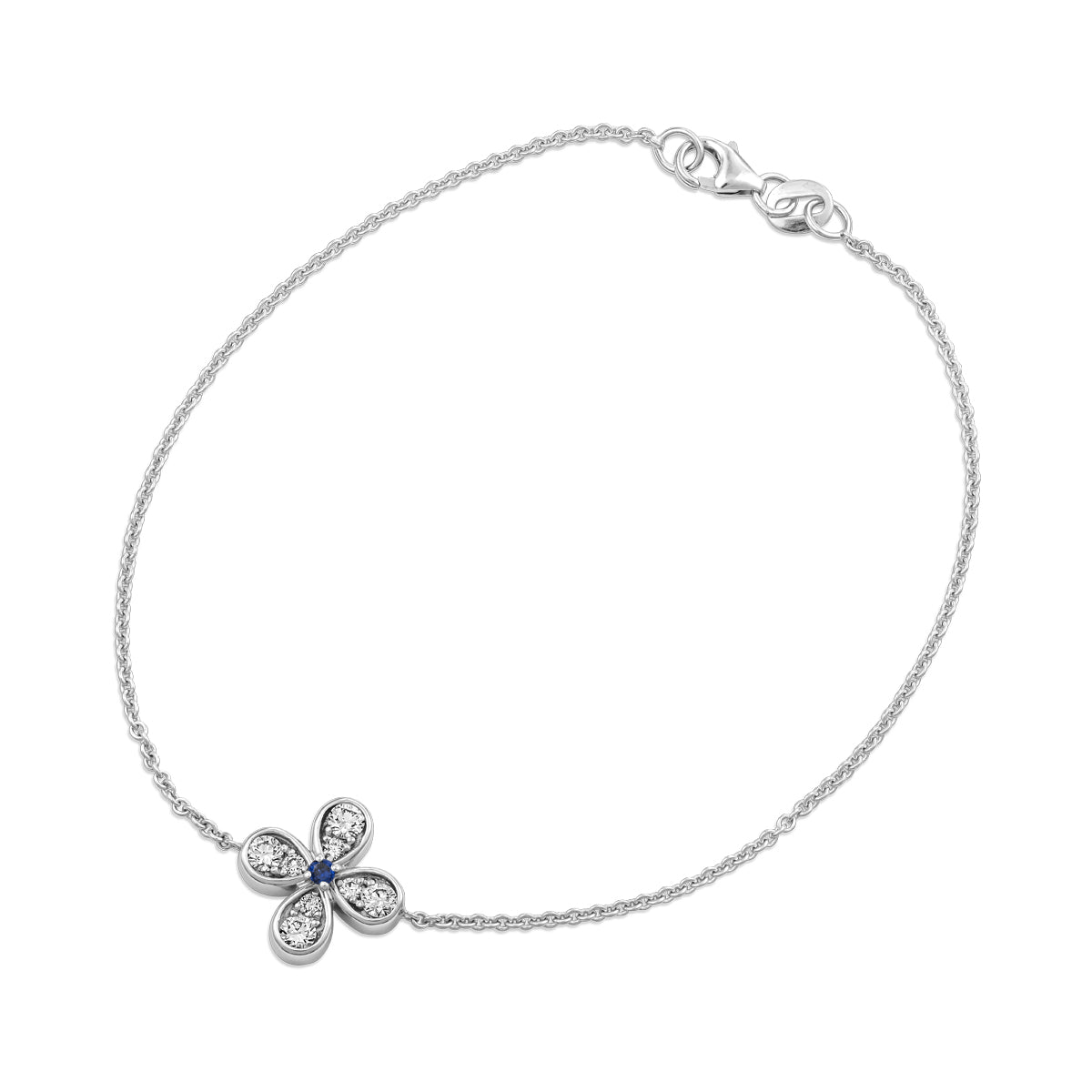 Bloom bracelet with a floral charm featuring a blue sapphire center and small diamond accents designed by carati jewelry in montreal canada in 18 k 14 k