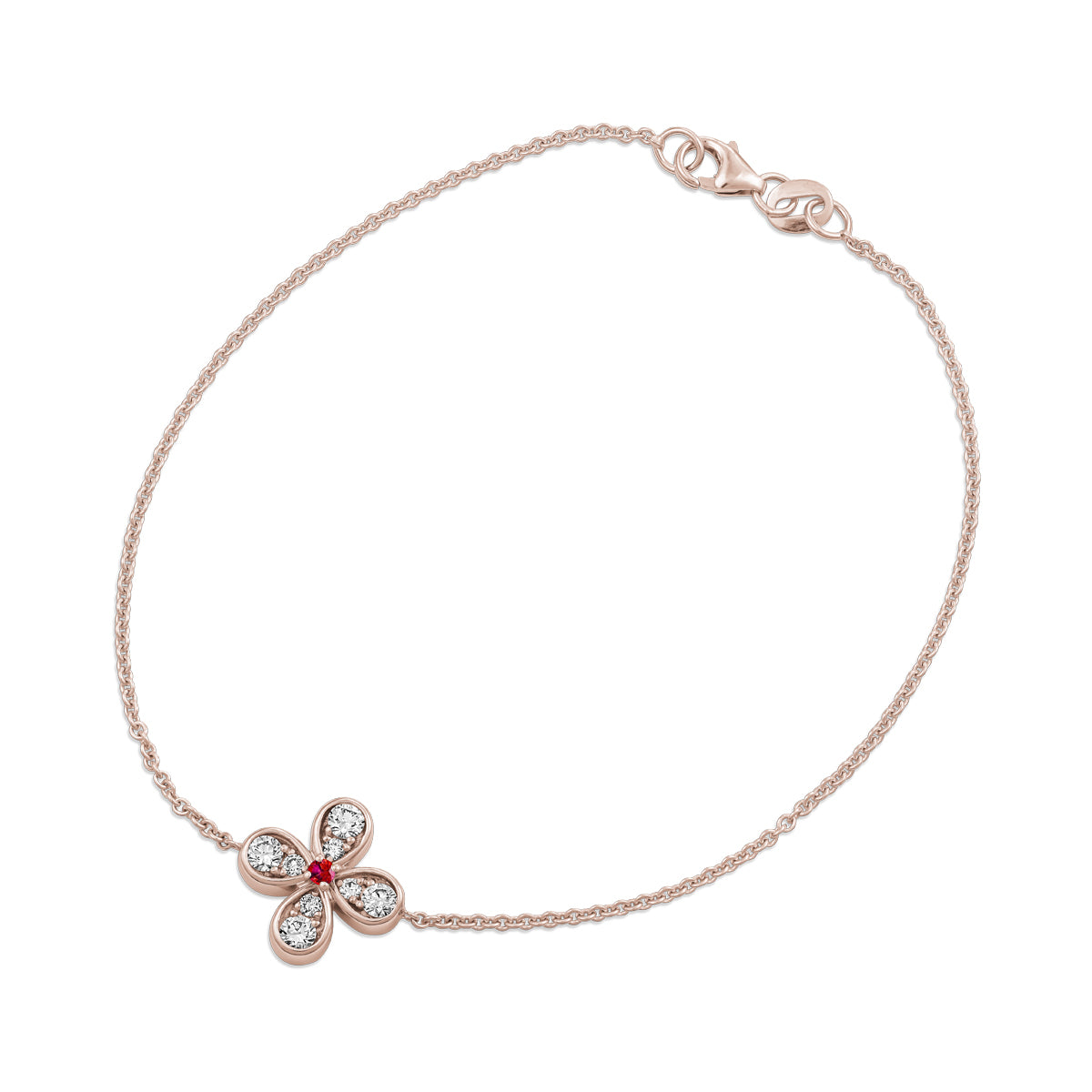 Bloom bracelet with a floral charm featuring a ruby center and small diamond accents designed by carati jewelry in montreal canada in 18 k 14 k