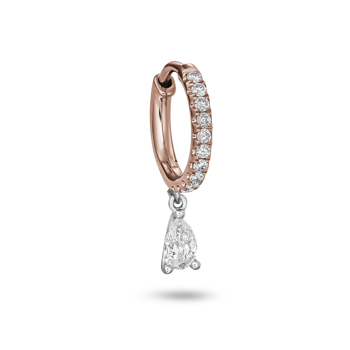 Hoop earring on one side with a pear diamond hanging on it designed by carati jewelry in montreal canada in 18 k 14 k in 2 tone high end jewelry