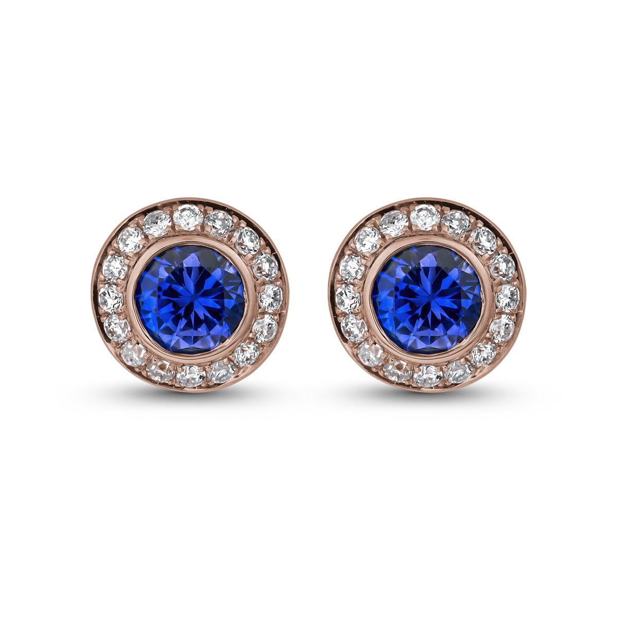 Royal Harmony earring Centered Around a stunning royal blue sapphire set all around pave in diamonds designed by carati jewelry in montreal canada in 14 k 18 k