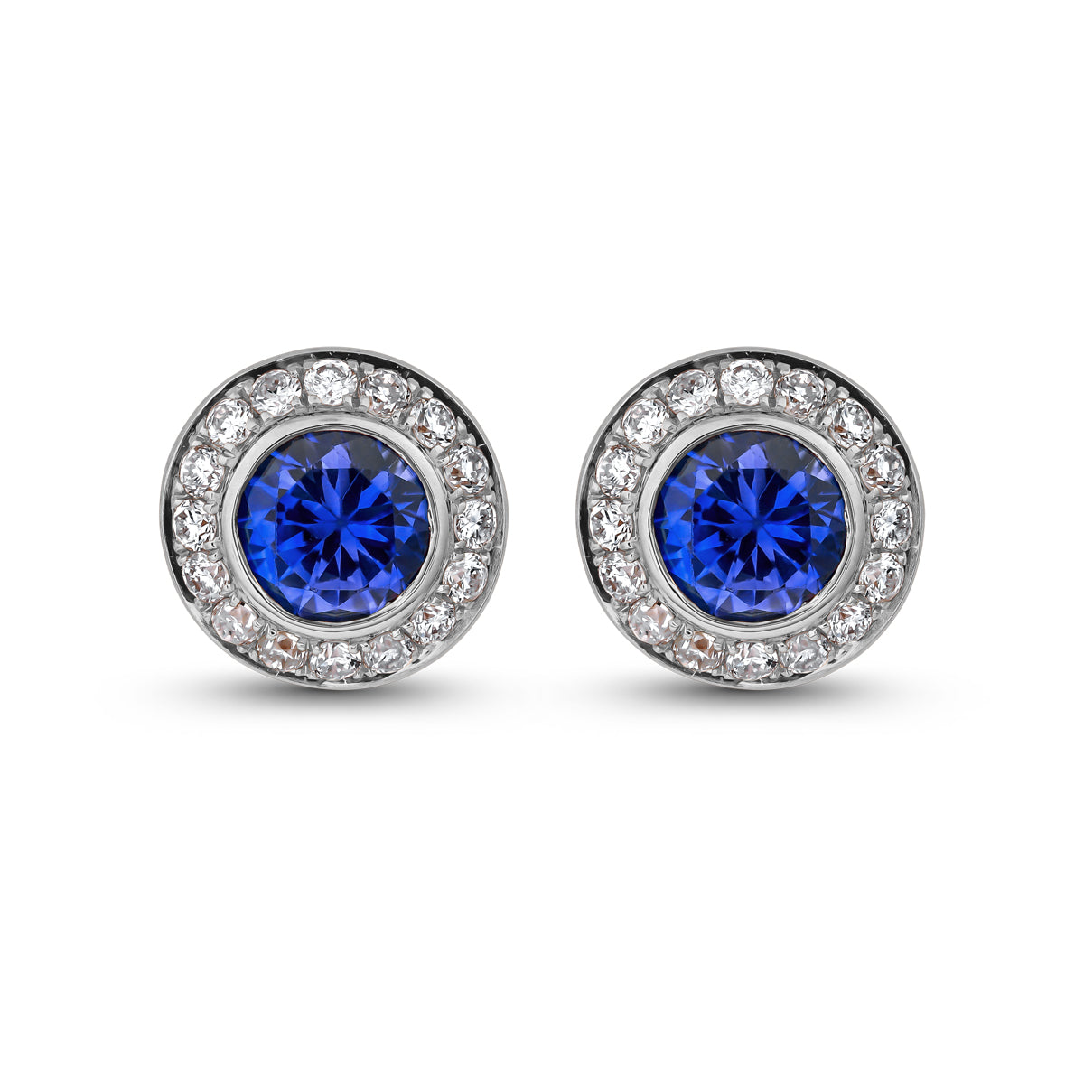 Royal Harmony earring Centered Around a stunning royal blue sapphire set all around pave in diamonds designed by carati jewelry in montreal canada in 14 k 18 k