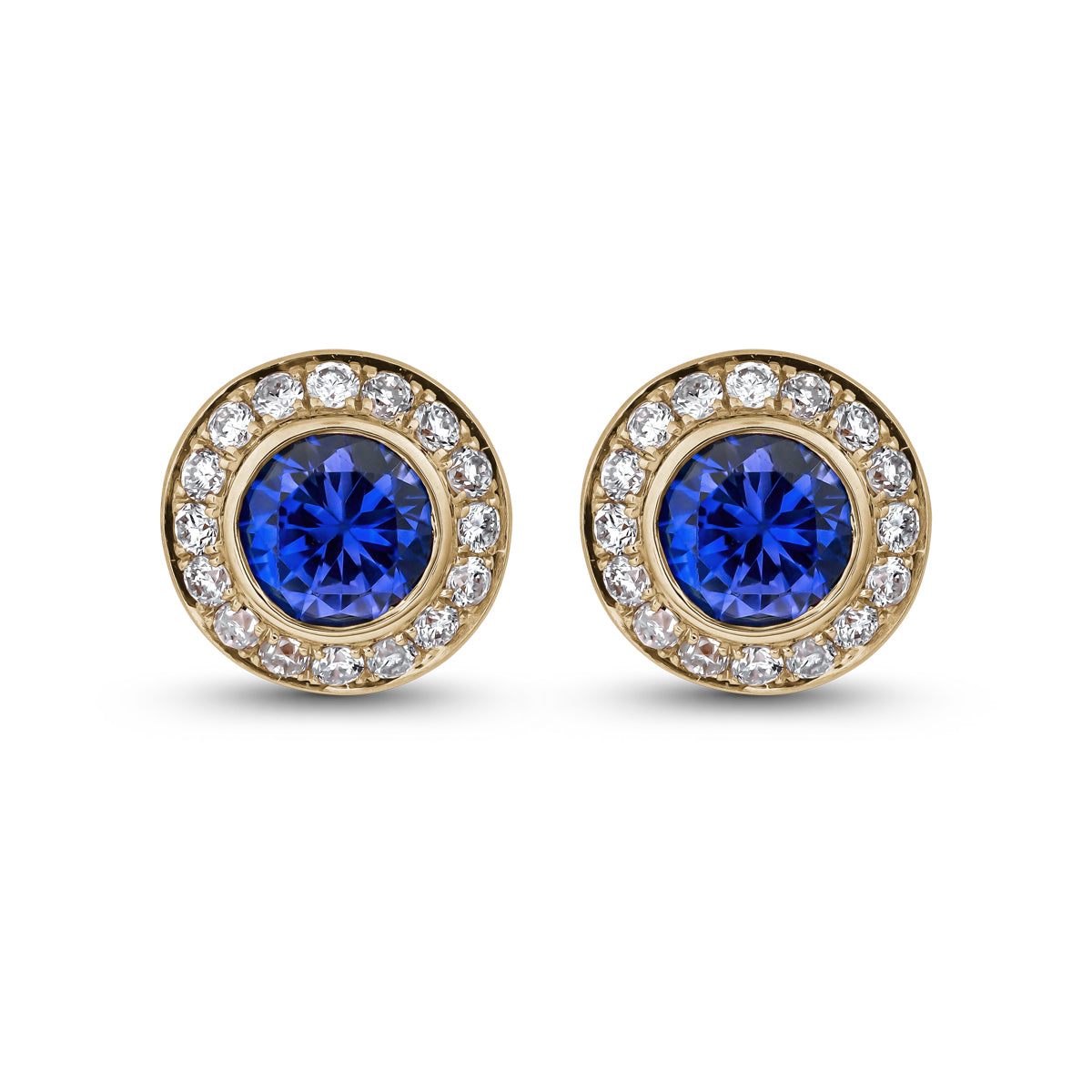 Royal Harmony earring Centered Around a stunning royal blue sapphire set all around pave in diamonds designed by carati jewelry in montreal canada in 14 k 18 k