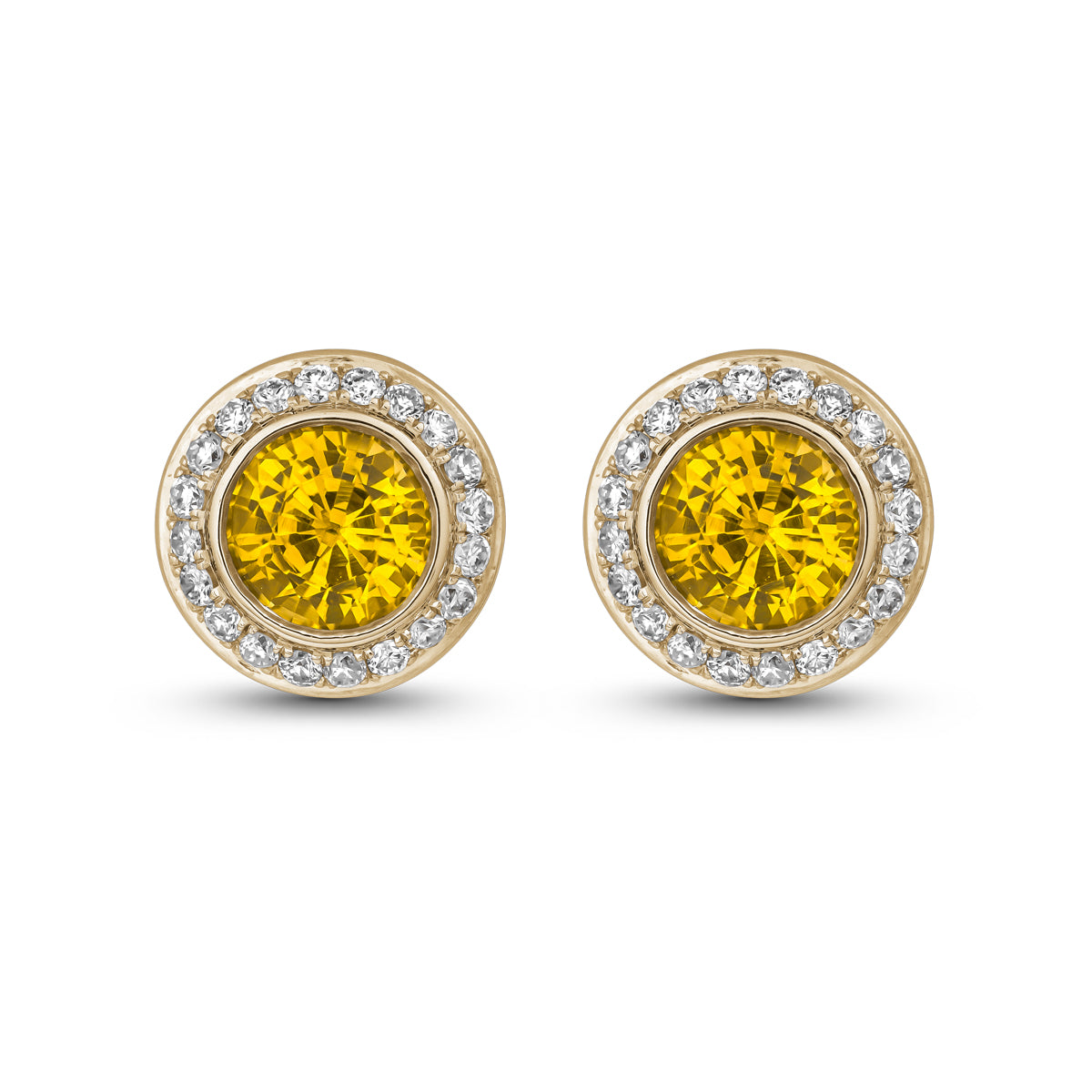 Royal Harmony earring Centered Around a stunning yellow sapphire set all around pave in diamonds designed by carati jewelry in montreal canada in 14 k 18 k