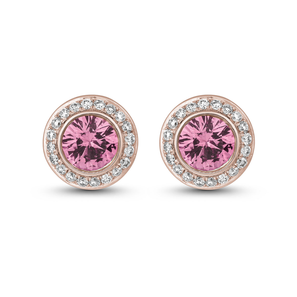 Royal Harmony earring Centered Around a stunning pink sapphire set all around pave in diamonds designed by carati jewelry in montreal canada in 14 k 18 k