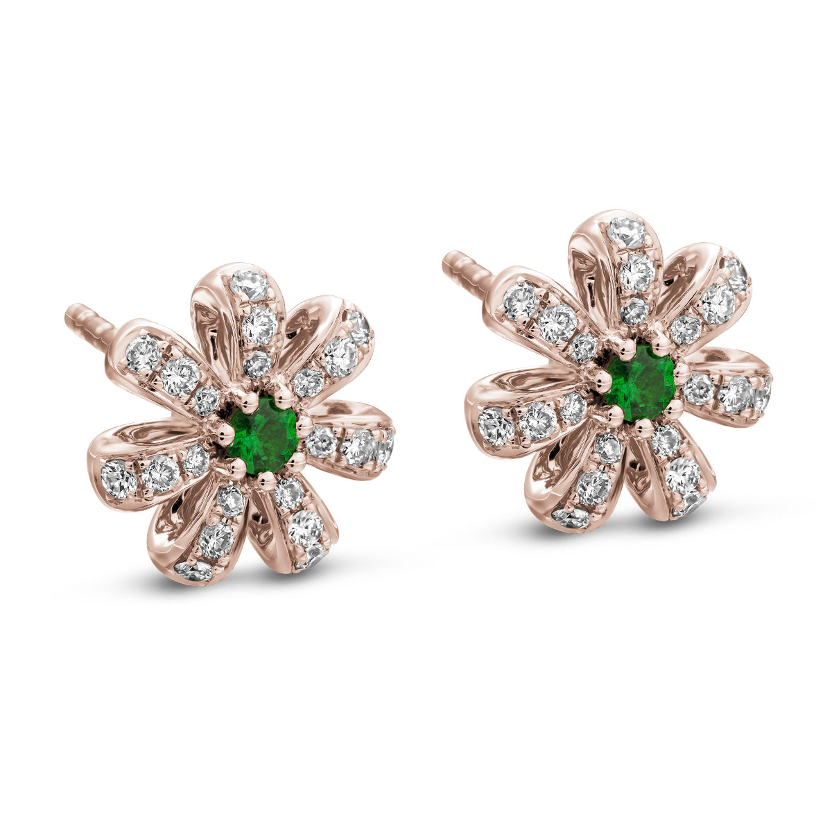 A pair of Fiora earrings with naturaln tsavorites centers and encrusted with diamonds set in pave designed by carati jewelry montreal canada 18k 14 k