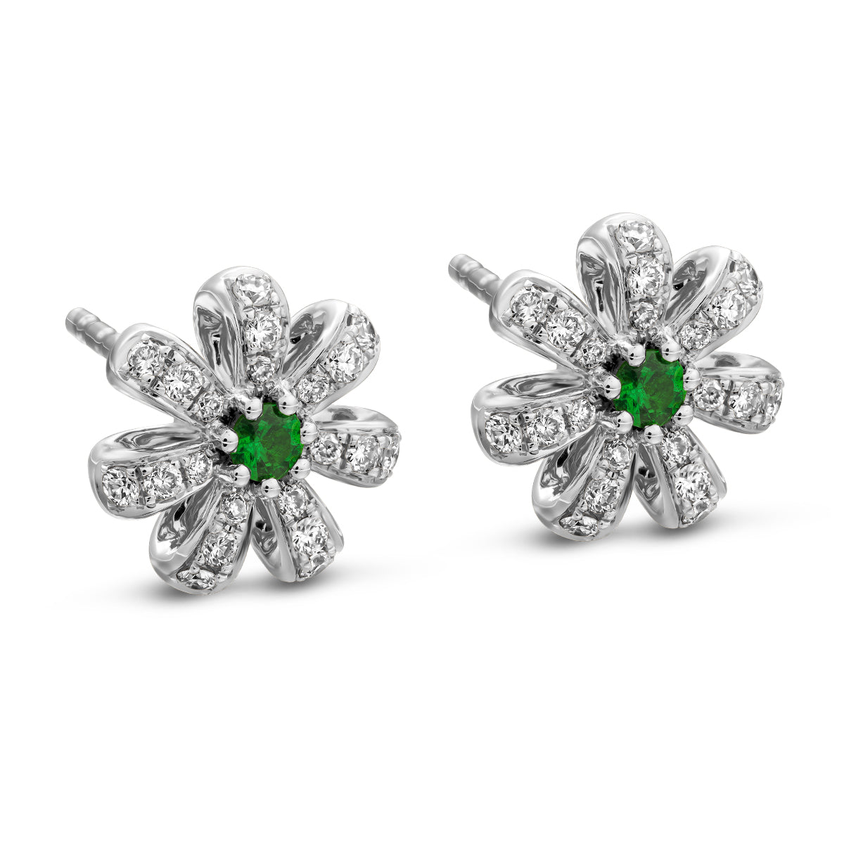 A pair of Fiora earrings with naturaln tsavorites centers and encrusted with diamonds set in pave designed by carati jewelry montreal canada 18k 14 k