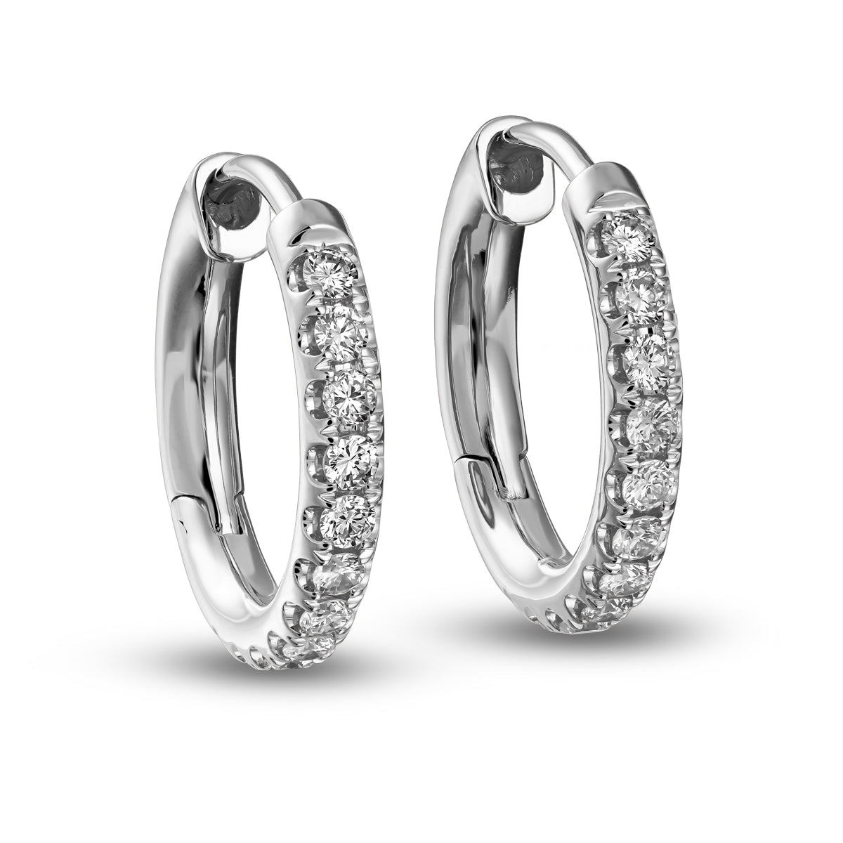 pair of big Hoops earring set in diamonds designed by carati jewelry montreal canada 18 k 14k
