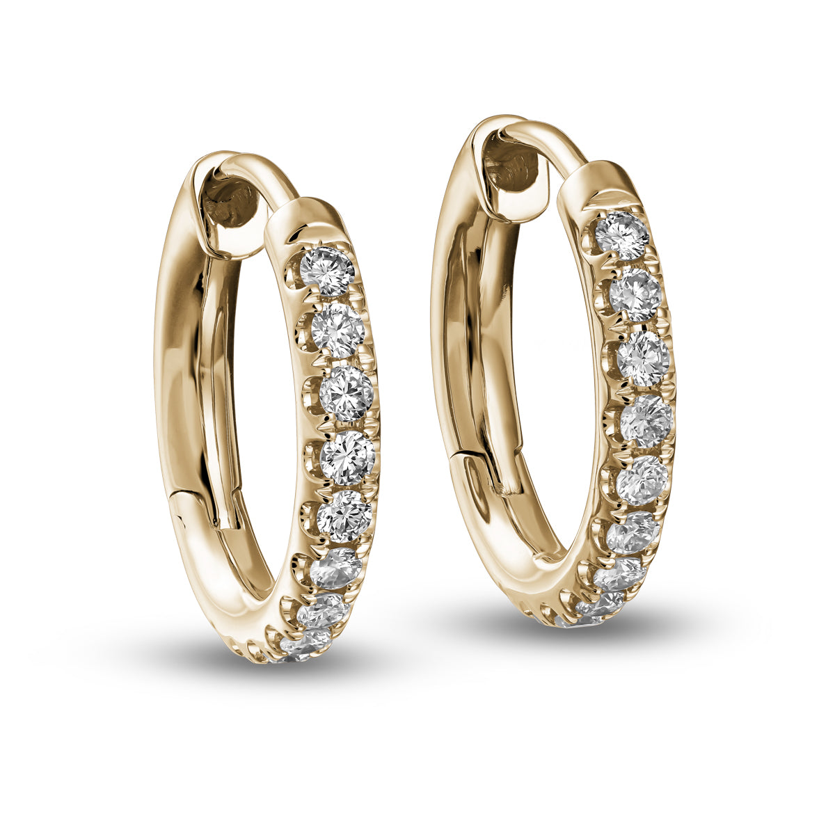 pair of big Hoops earring set in diamonds designed by carati jewelry montreal canada 18 k 14k