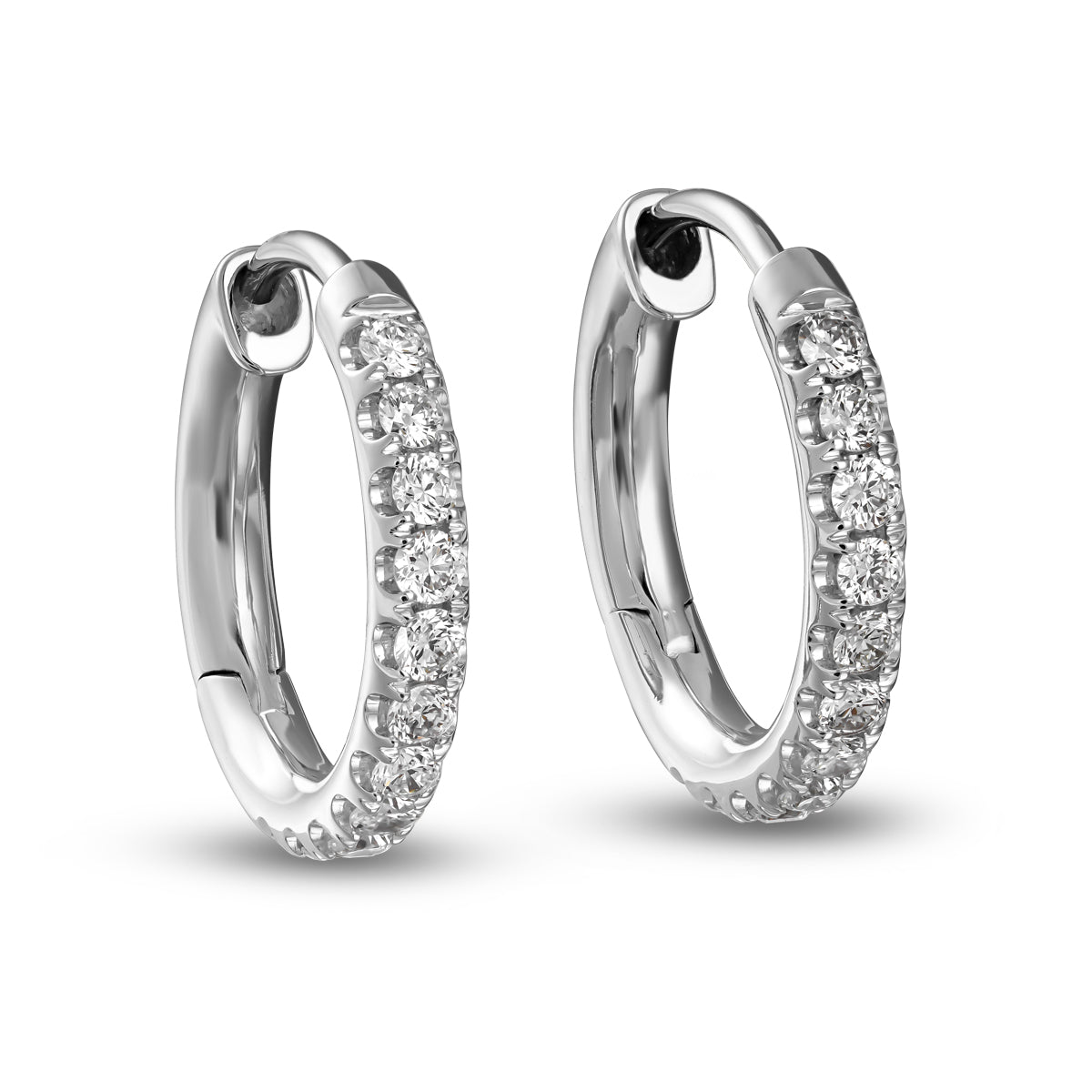 pair of Hoops earring set in diamonds designed by carati jewelry montreal canada 18 k 14k