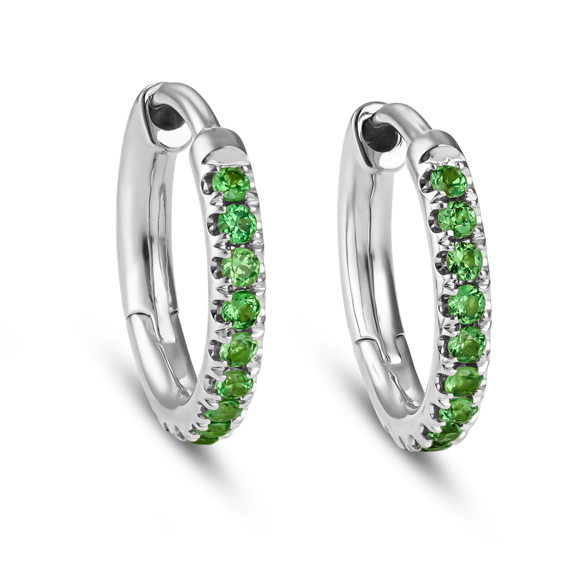 A pair of small gold hoop earrings with tsavorite accents from carati jewelry 14k 18 k montreal canada