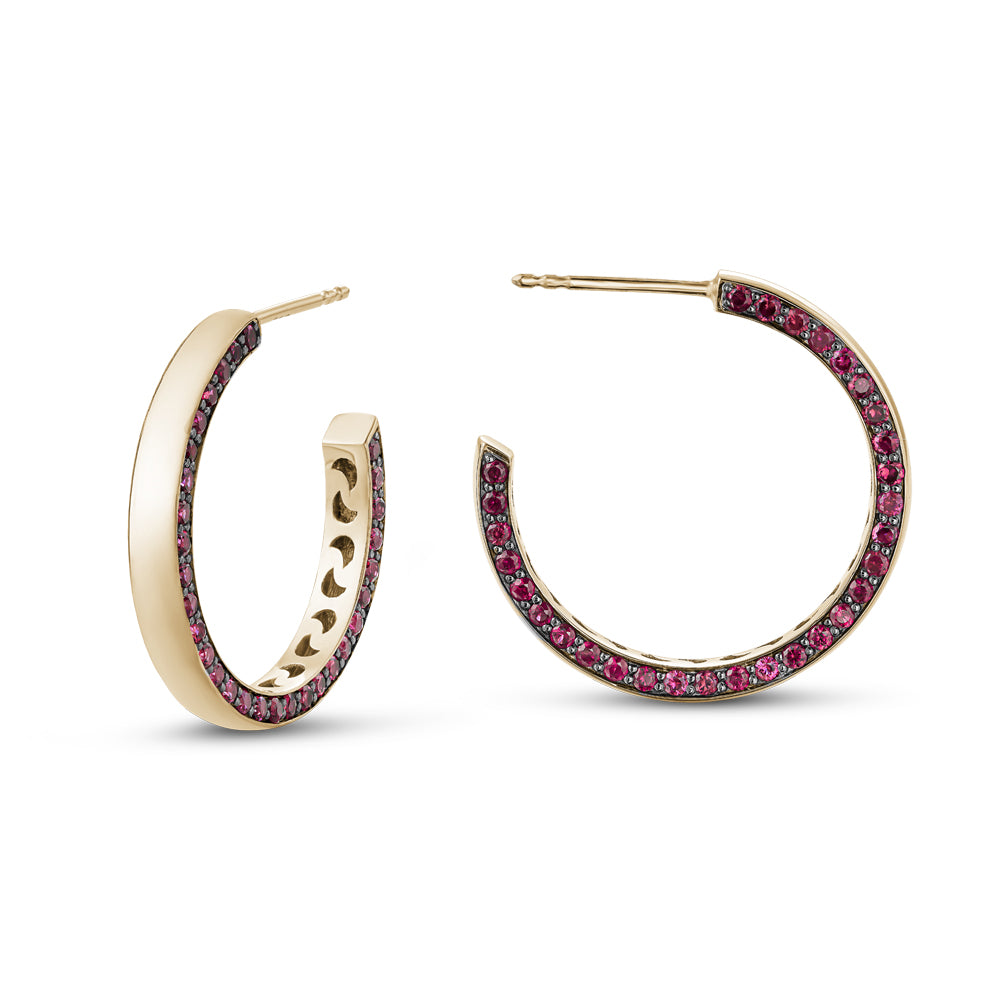 14 k yellow gold big eclipse earring set with rubiess on one side designed carati jewelry montreal