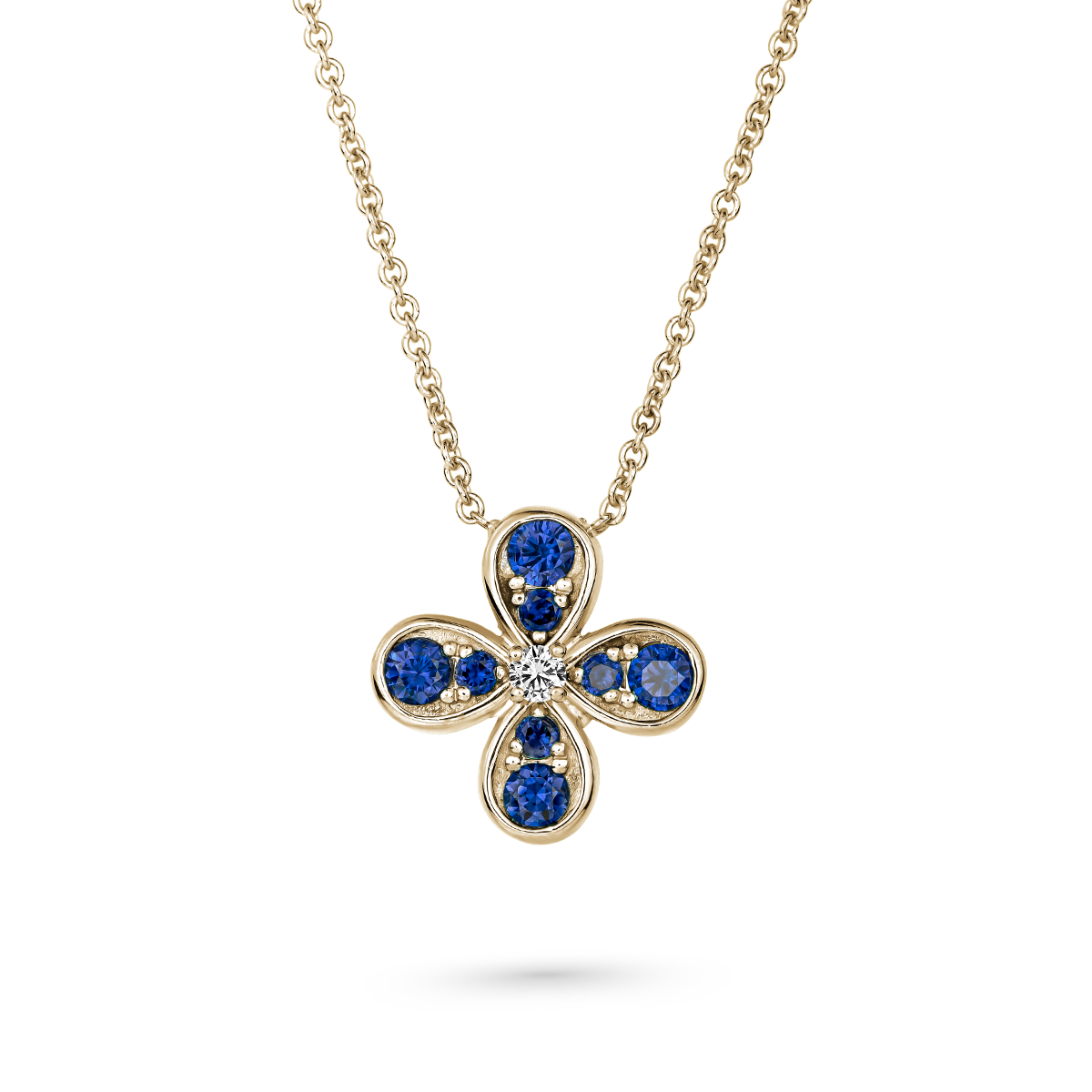 Bloom pendant set in royal blue sapphires and a diamond in the middle designed by carati jewelry montreal canada 18k 14 k