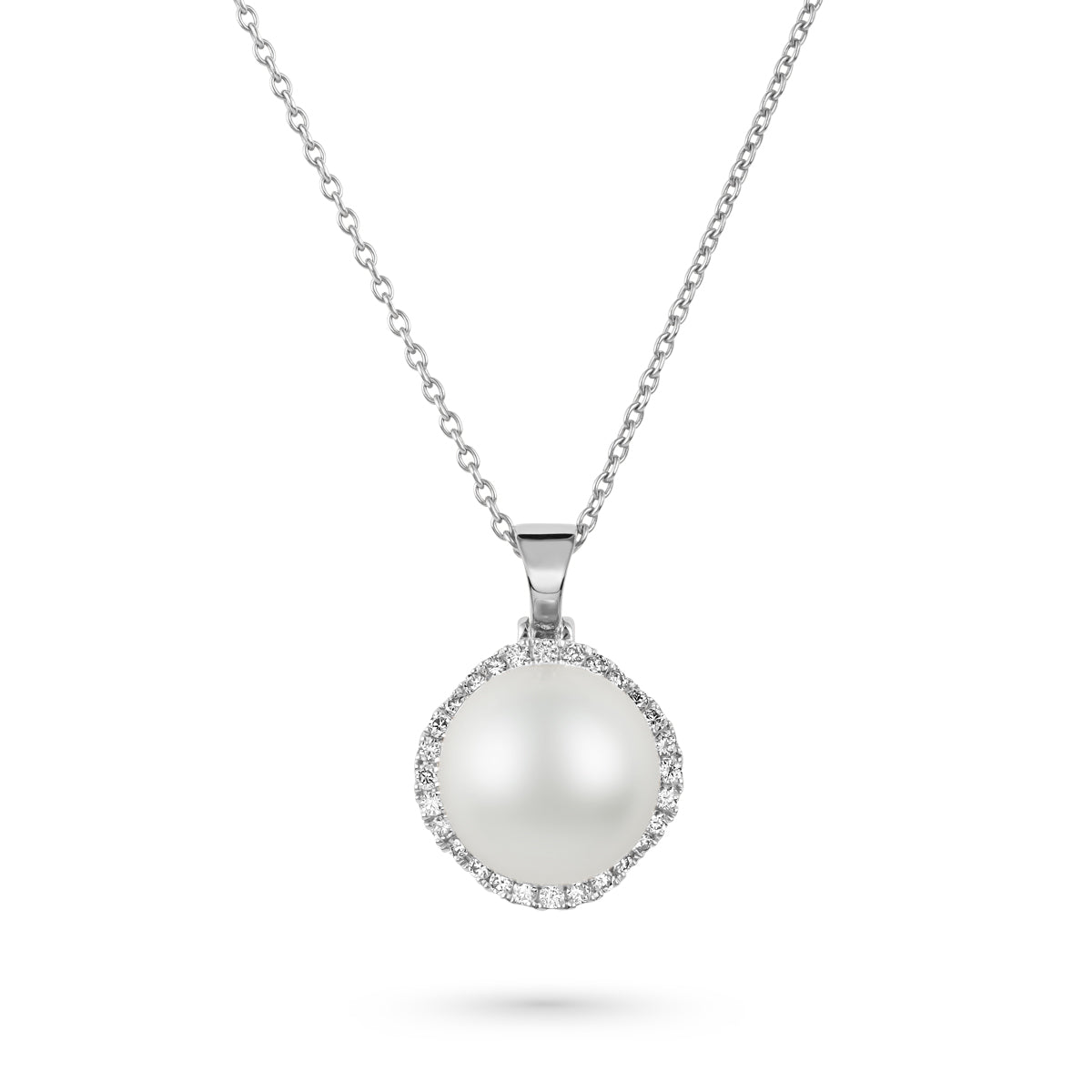 A natural pearl pendant with petal design nested within a circle of sparkling diamonds, mounted on a rose gold chain sophisticated spark designed by carati jewelry in montreal canada in 18 k 14 k