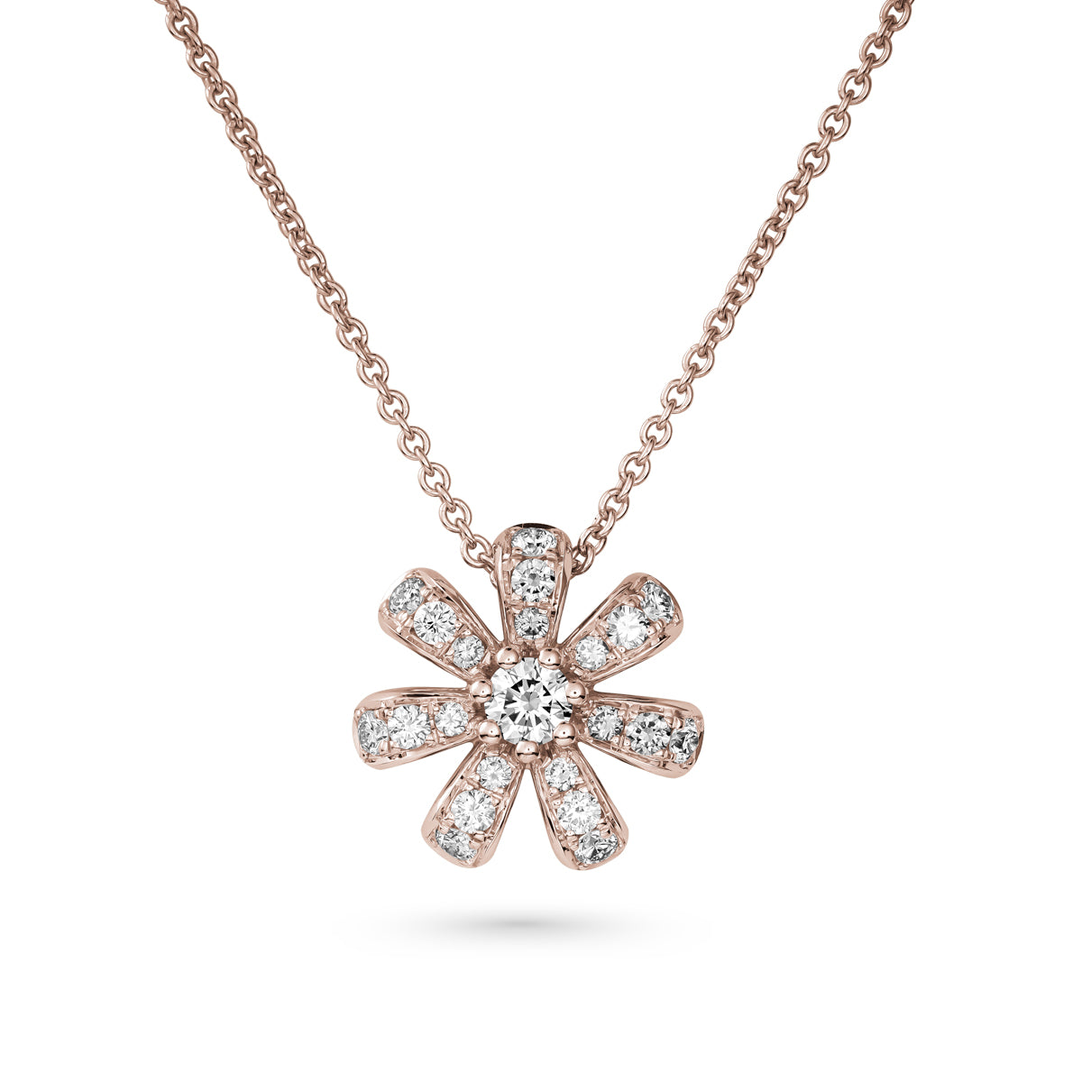 Fiora pendant set in pave diamonds a Sparkling diamond in the middle is iconic design from carati jewelry in montreal canada in 18k 14 k