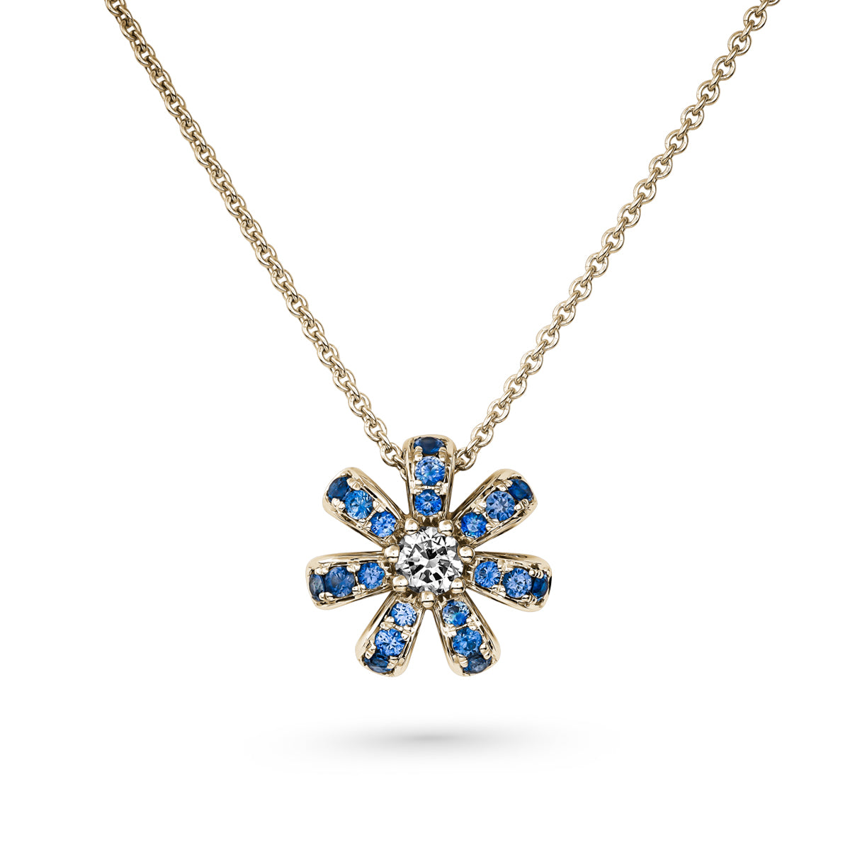 Fiora mini pendant set in pave blue sapphires and a Sparkling diamond in the middle is iconic design from carati jewelry in montreal canada in 1k 14 k
