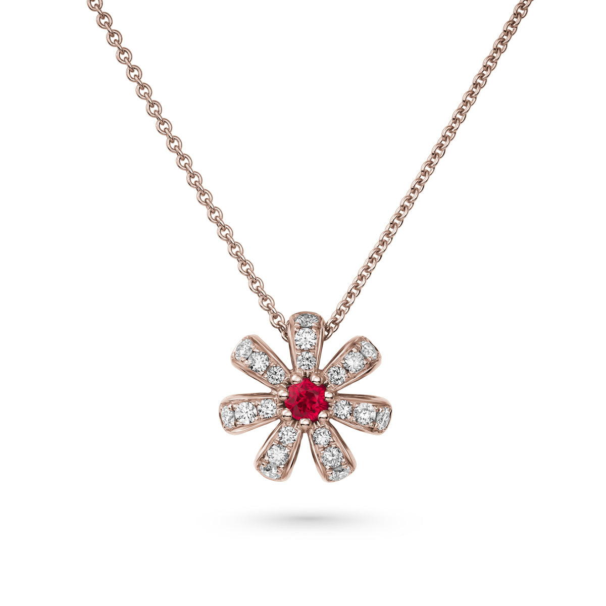 Fiora pendant set in pave diamonds a Sparkling ruby in the middle is iconic design from carati jewelry in montreal canada in 18k 14 k