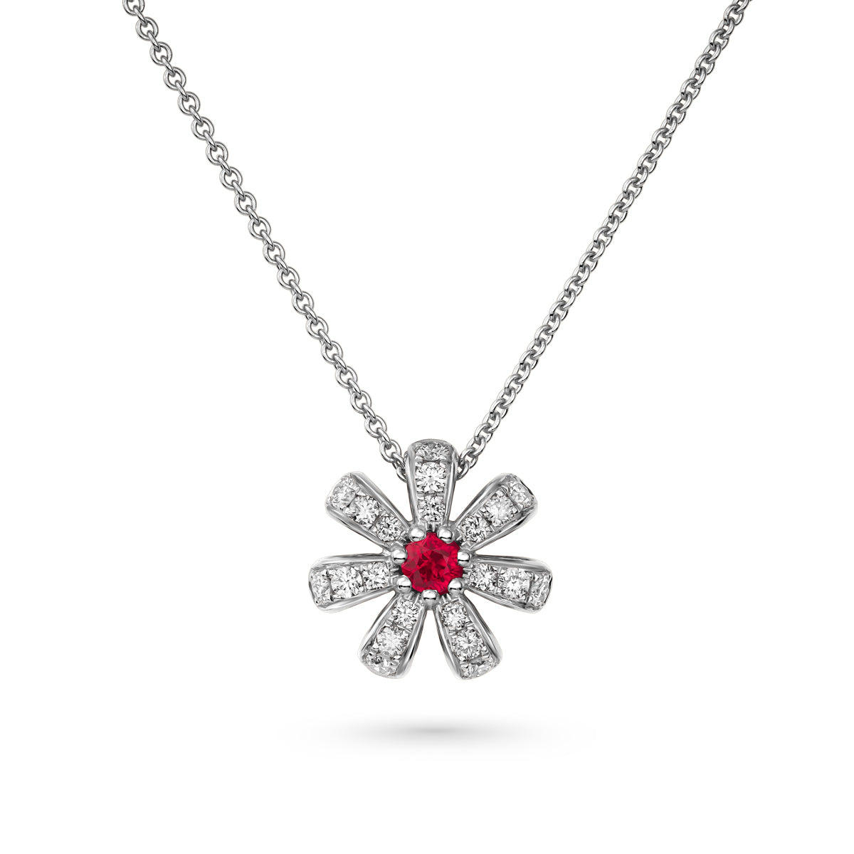 Fiora pendant set in pave diamonds a Sparkling ruby in the middle is iconic design from carati jewelry in Montreal Canada in 18k 14 k