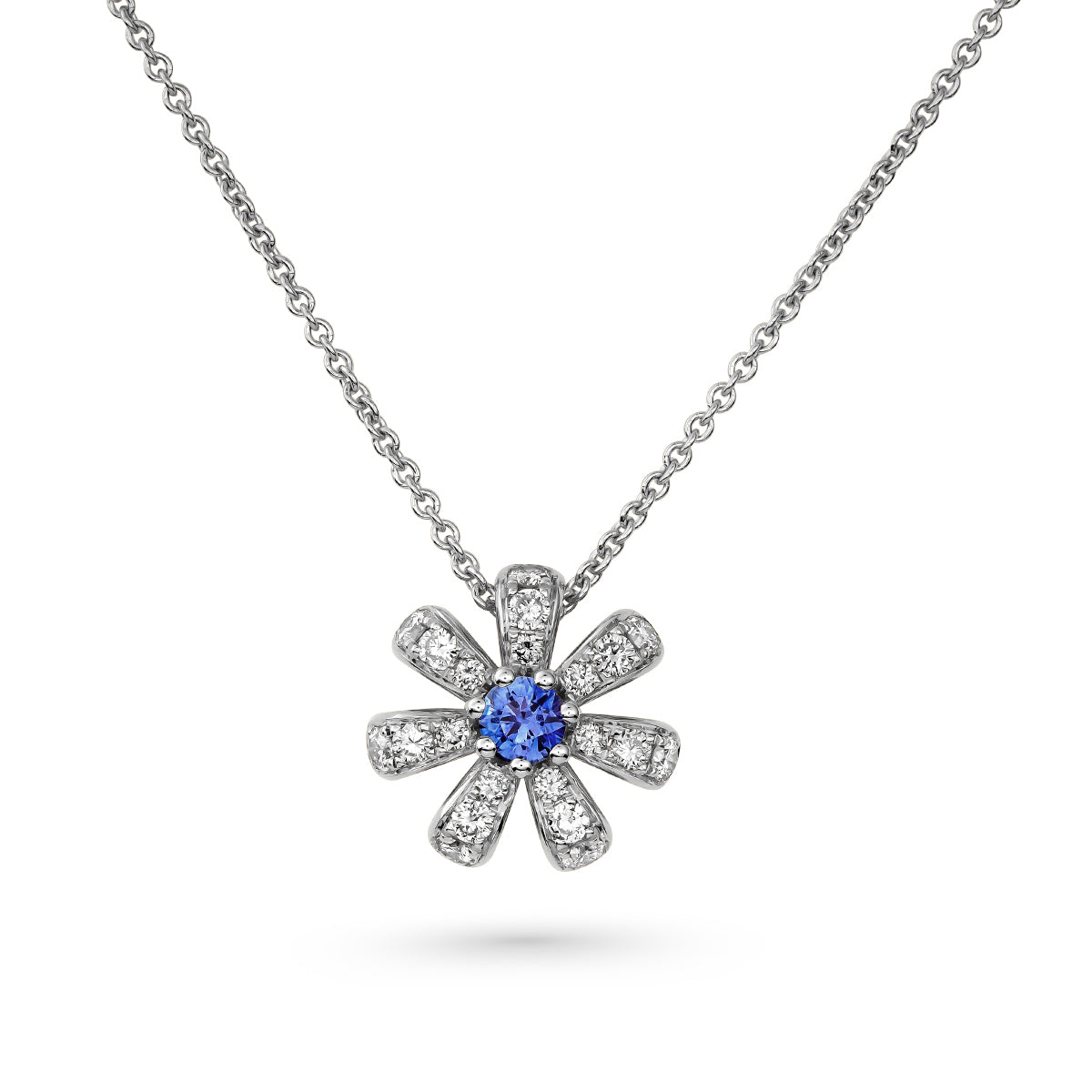 Fiora pendant set in pave Diamonds and a Sparkling blue Sapphire in the middle is iconic design from carati jewelry in montreal canada in 1k 14 k