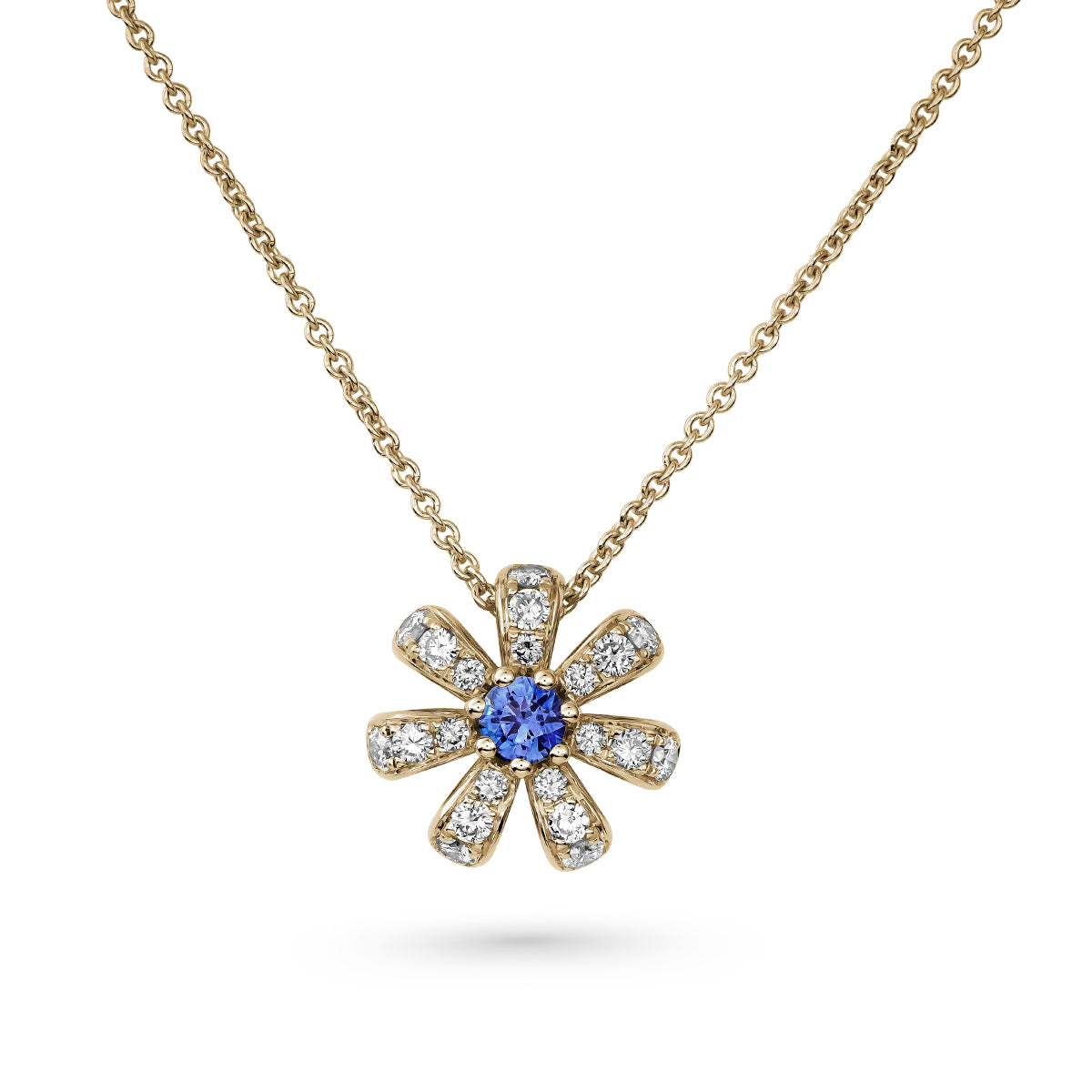 Fiora pendant set in pave Diamonds and a Sparkling blue Sapphire in the middle is iconic design from carati jewelry in montreal canada in 1k 14 k