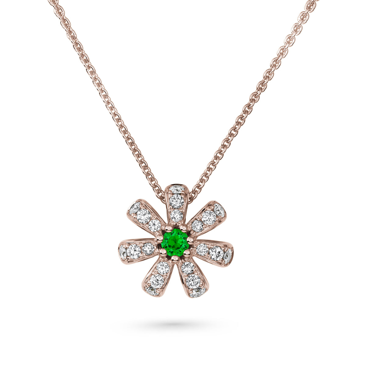 Fiora pendant set in pave diamonds a Sparkling tsavorite in the middle is iconic design from carati jewelry in montreal canada in 18k 14 k
