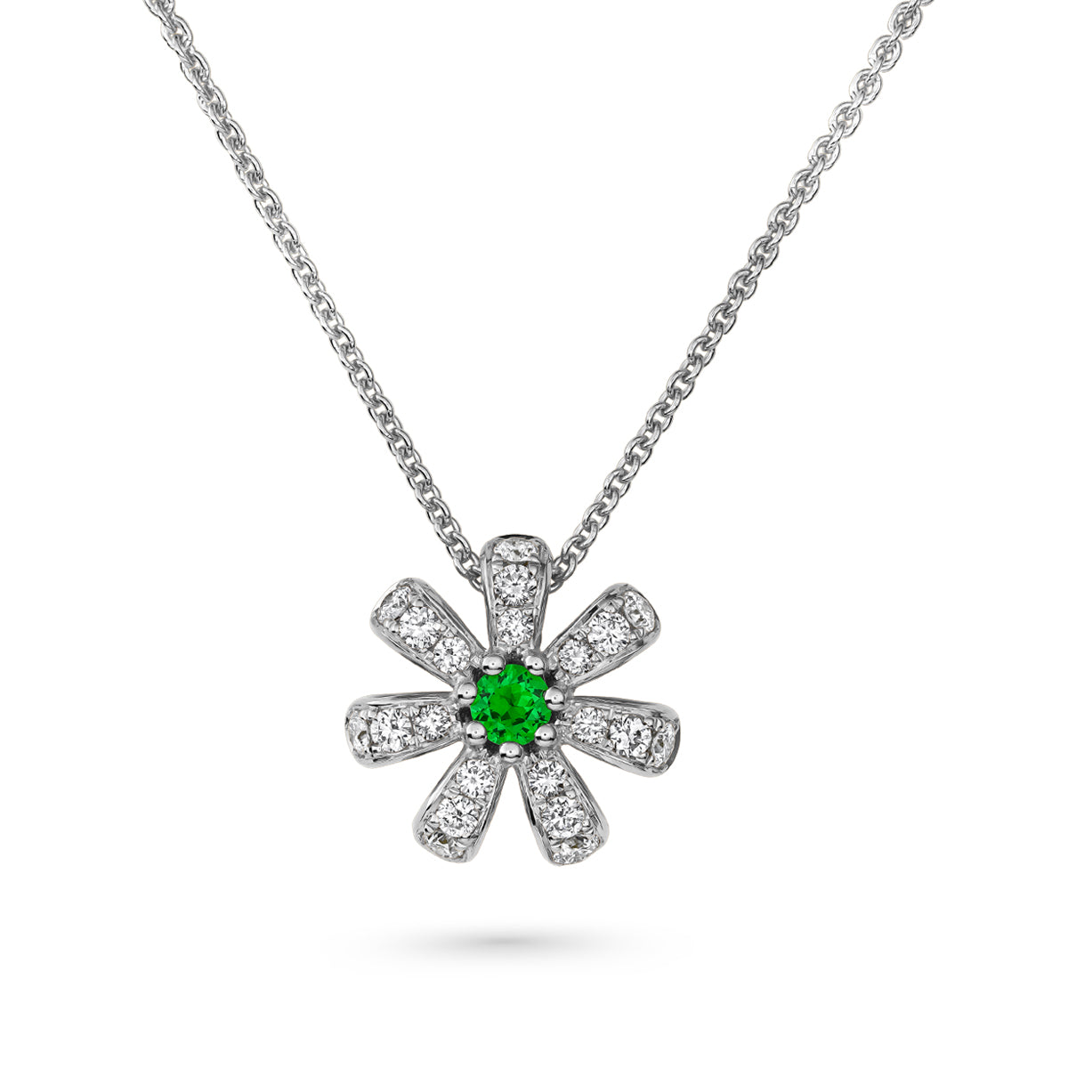Fiora pendant set in pave diamonds a Sparkling tsavorite in the middle is iconic design from carati jewelry in montreal canada in 18k 14 k