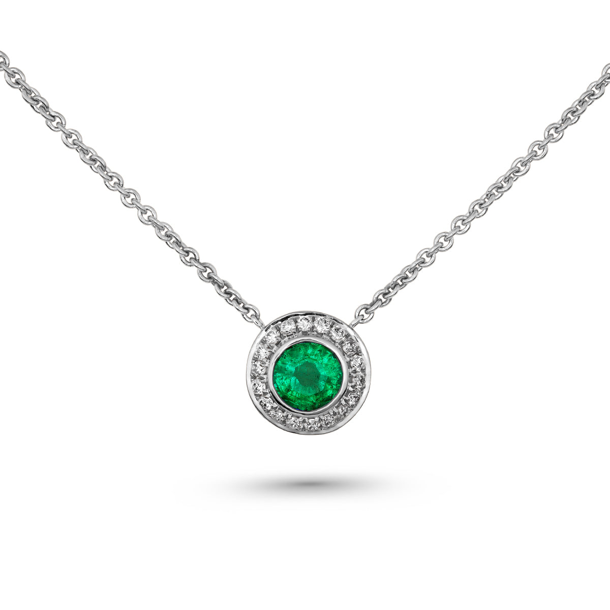 Royal Harmony pendant Centered Around a stunning emerald set all around pave in diamonds designed by carati jewelry in montreal canada in 14 k 18 k