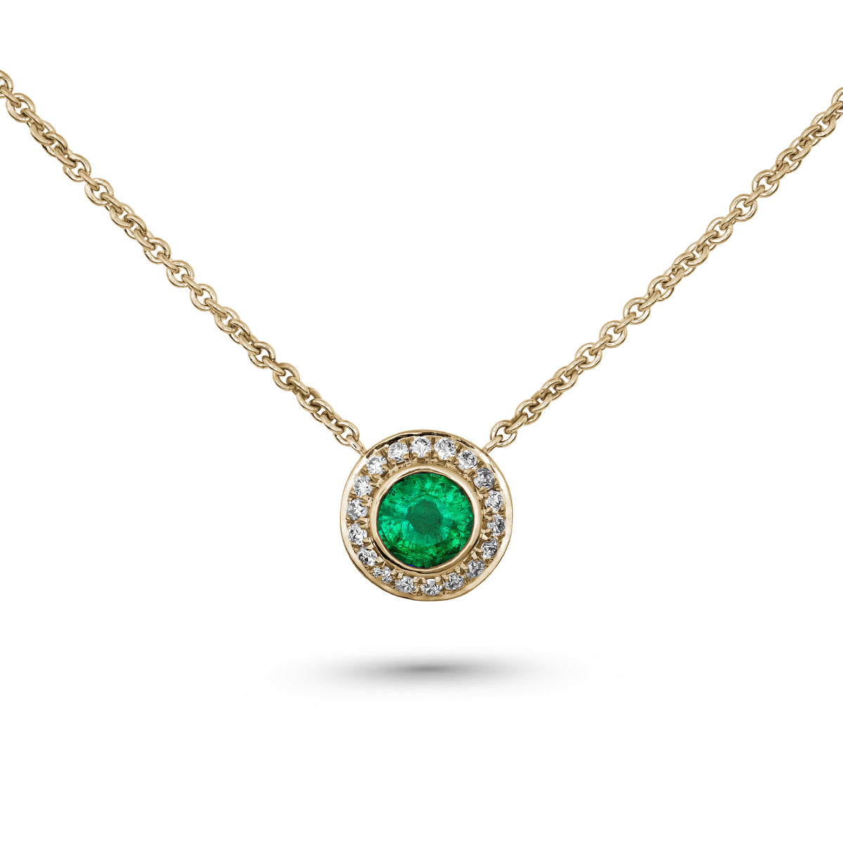 Royal Harmony pendant Centered Around a stunning emerald set all around pave in diamonds designed by carati jewelry in montreal canada in 14 k 18 k