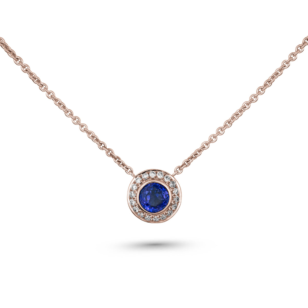 Royal Harmony pendant Centered Around royal blue sapphire set all around pave in diamonds designed by carati jewelry in montreal canada in 14 k 18 k