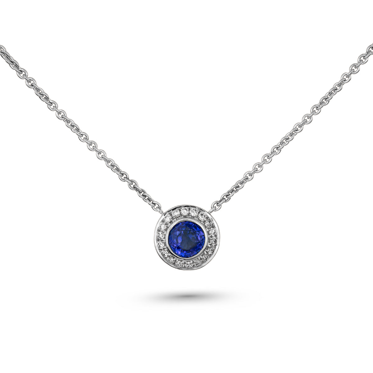 Royal Harmony pendant Centered Around royal blue sapphire set all around pave in diamonds designed by carati jewelry in montreal canada in 14 k 18 k