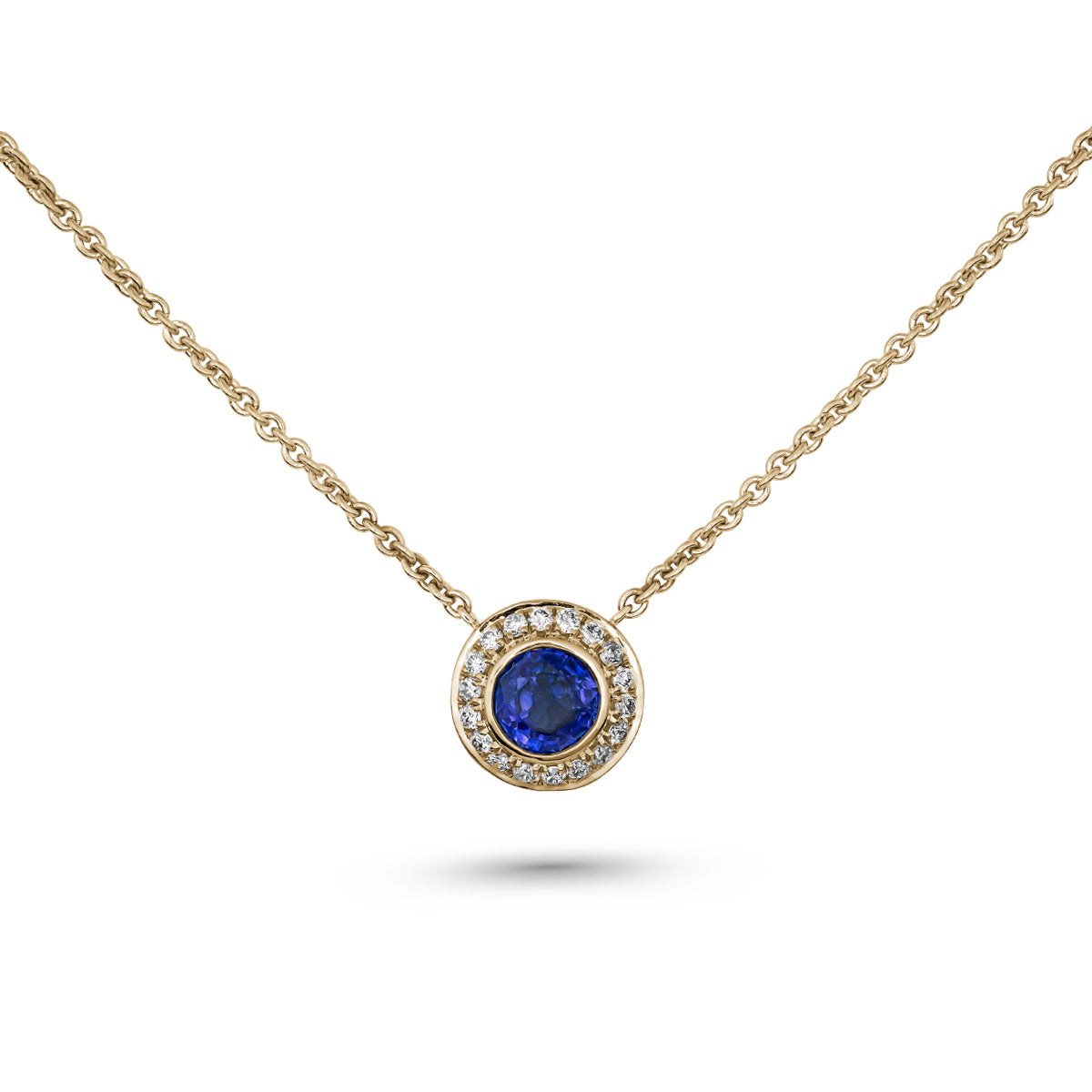 Royal Harmony pendant Centered Around royal blue sapphire set all around pave in diamonds designed by carati jewelry in montreal canada in 14 k 18 k