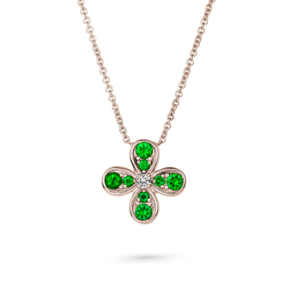 Bloom pendant set with tsavorites and a diamond in the middle designed by carati jewelry montreal canada 18k 14 k