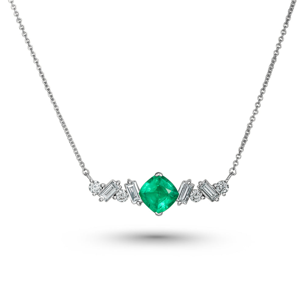 Cascade pendant in 14 k white gold centered a cushion emerald with baguettes and round diamonds carati jewelry montreal