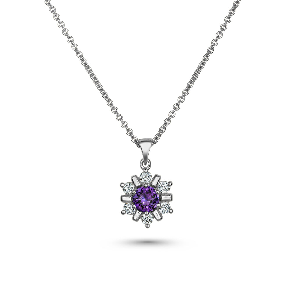 18k white gold snowflake pendant with purple sapphire in the middle and set around in diamonds carati jewelry montreal