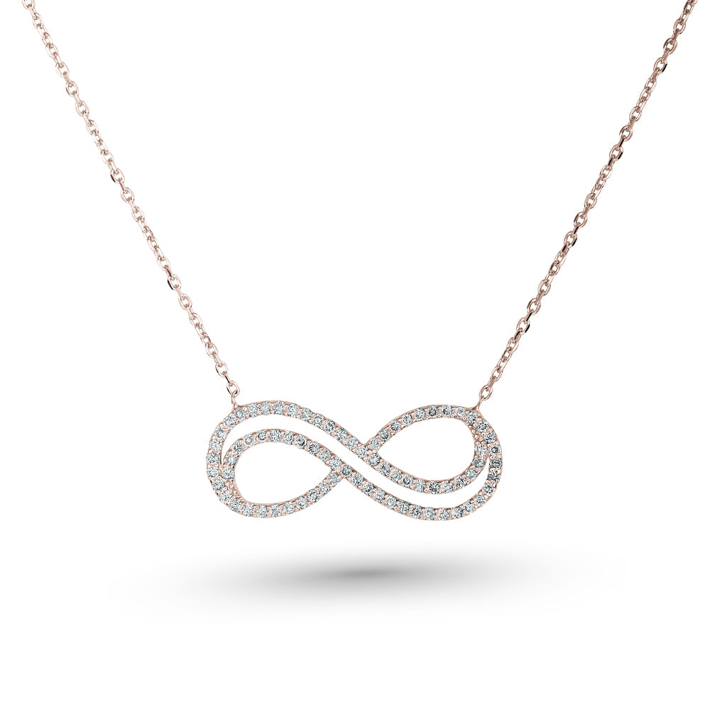 Infinity pendant in 14 k rose gold set with micro diamonds carati jewelry montreal