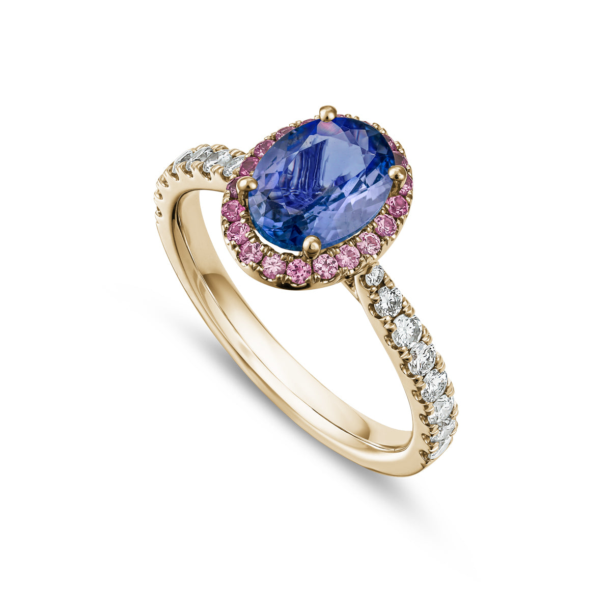 An engagement ring featuring an oval cut tanzanite center stone with a halo of pink sapphires and diamonds around it, set in a white gold band designed by carati jewelry in montreal canada in 18 k 14 k