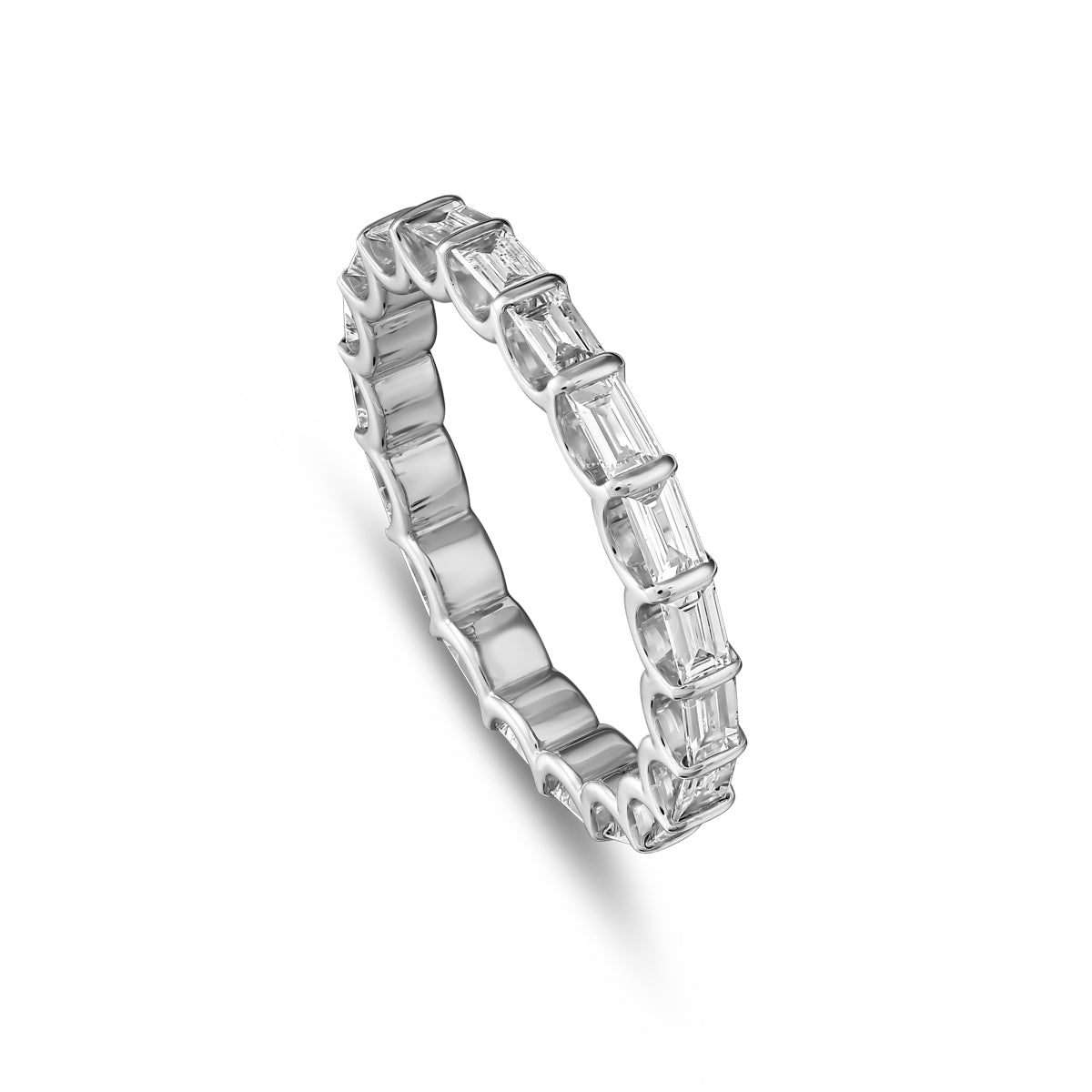 Triumph full eternity ring set with baquettes in a arc design,designed by carati jewelry montreal canada 18 k 14 k