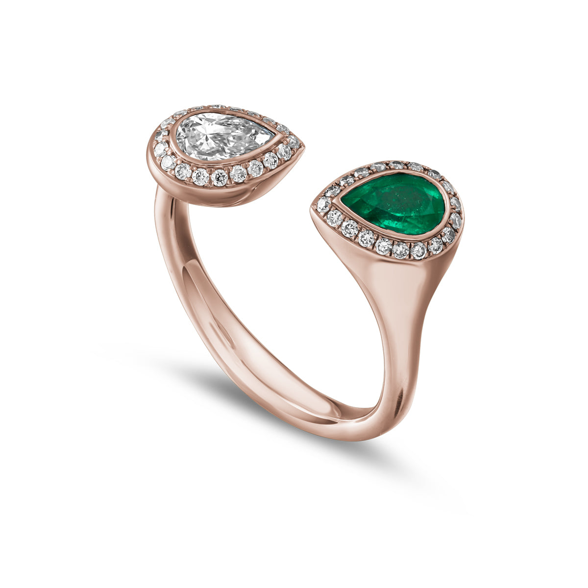 Toi et moi reimagined with pear emerald and diamond surrounded by pave set diamonds designed by carati jewelry montreal canada 14 k 18 k
