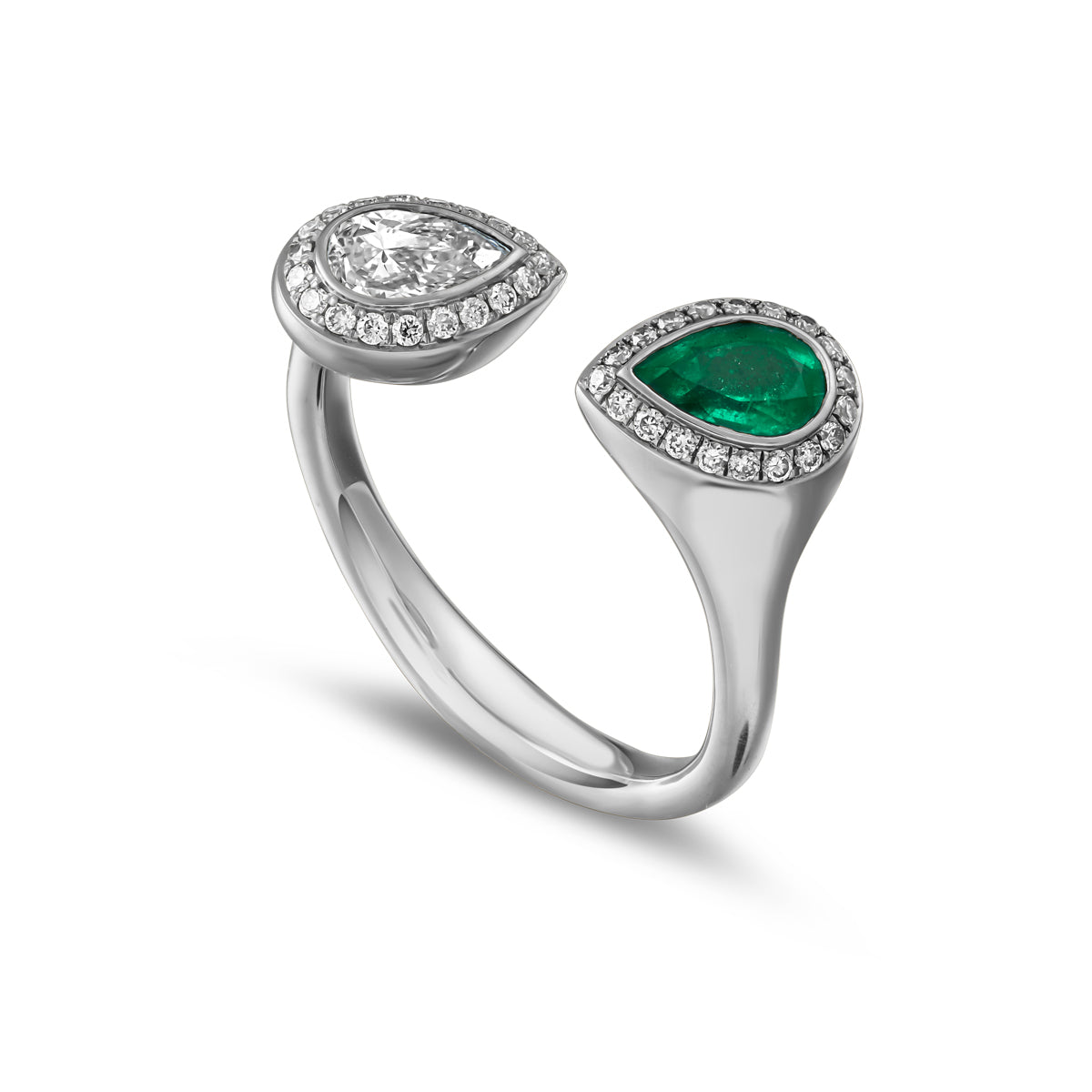 Toi et moi reimagined with pear emerald and diamond surrounded by pave set diamonds designed by carati jewelry montreal canada 14 k 18 k