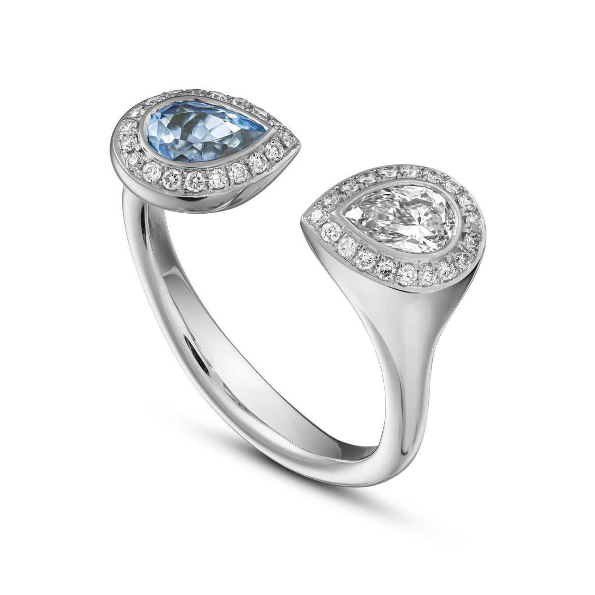 Toi et moi reimagined with pear aquamarine and diamond surrounded by pave set diamonds designed by carati jewelry montreal canada 14 k 18 k