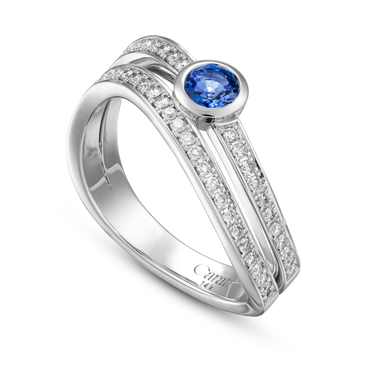 Double Wavy Ring with a royal blue sapphire in the middle and diamonds set in pave , iconic design by carati jewelry in montreal canada in 18k 14k