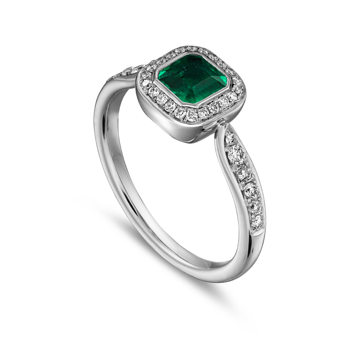 Royal harmony ring with bigger tie emerald surrounded by pave diamonds and on the shank designed by carati jewelry in montreal canada 18k 14 k