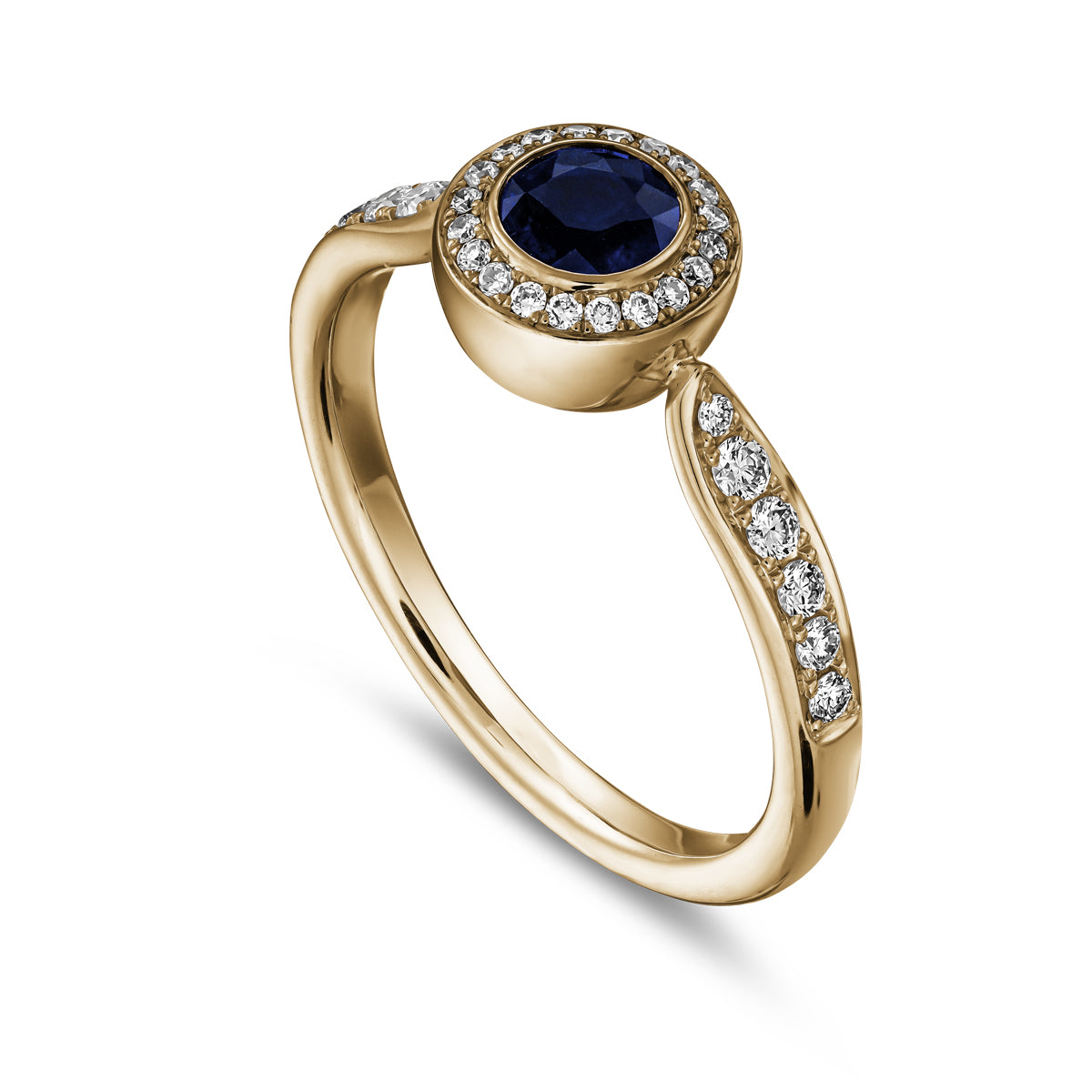 Royal harmony ring with round royal blue sapphireb surrounded by pave diamonds and on the shank designed by carati jewelry in montreal canada 18k 14 k