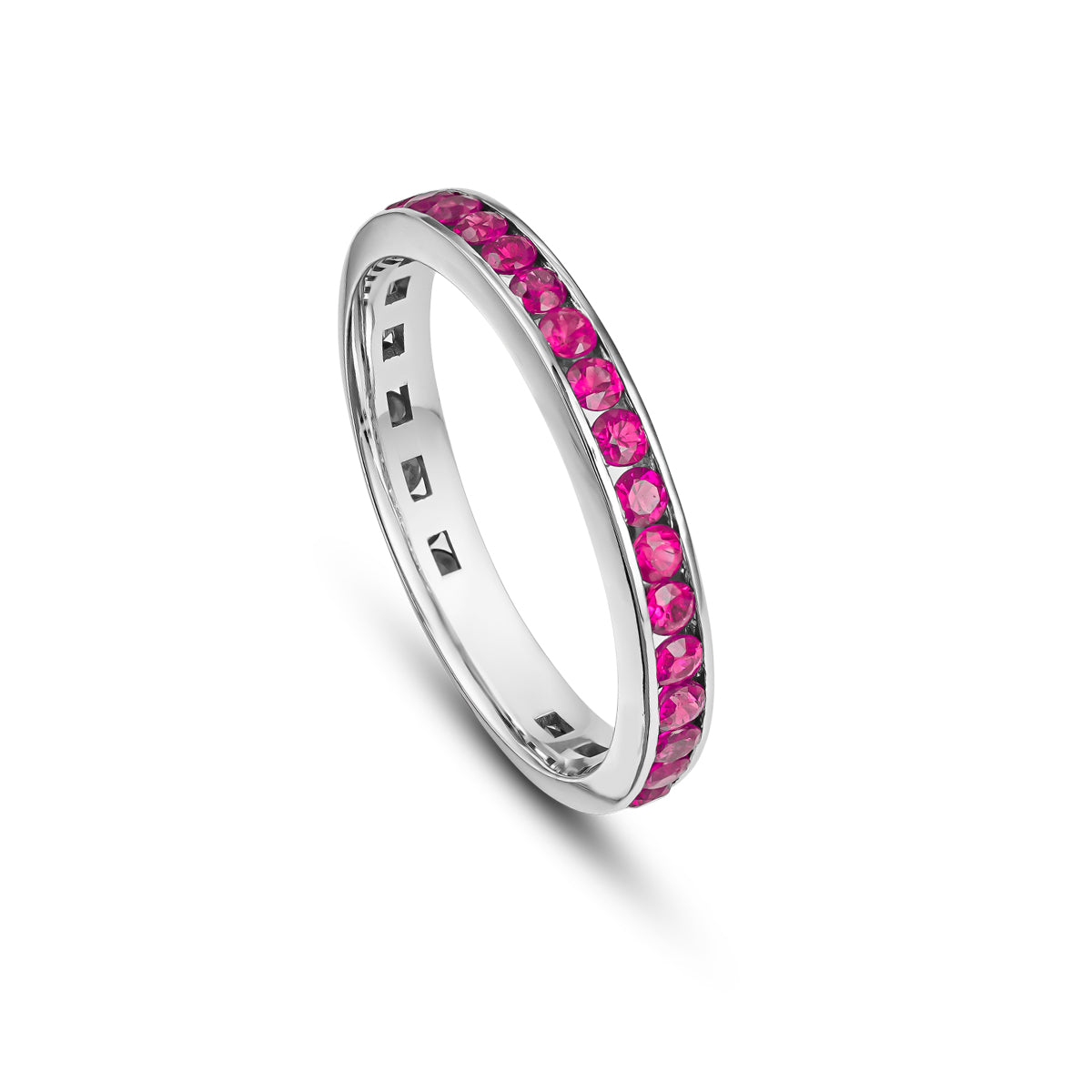 A gold wedding band featuring a channel set of full rubies, with a total of 14 rubies visible in the image.wedding bands channel set rubies diamonds