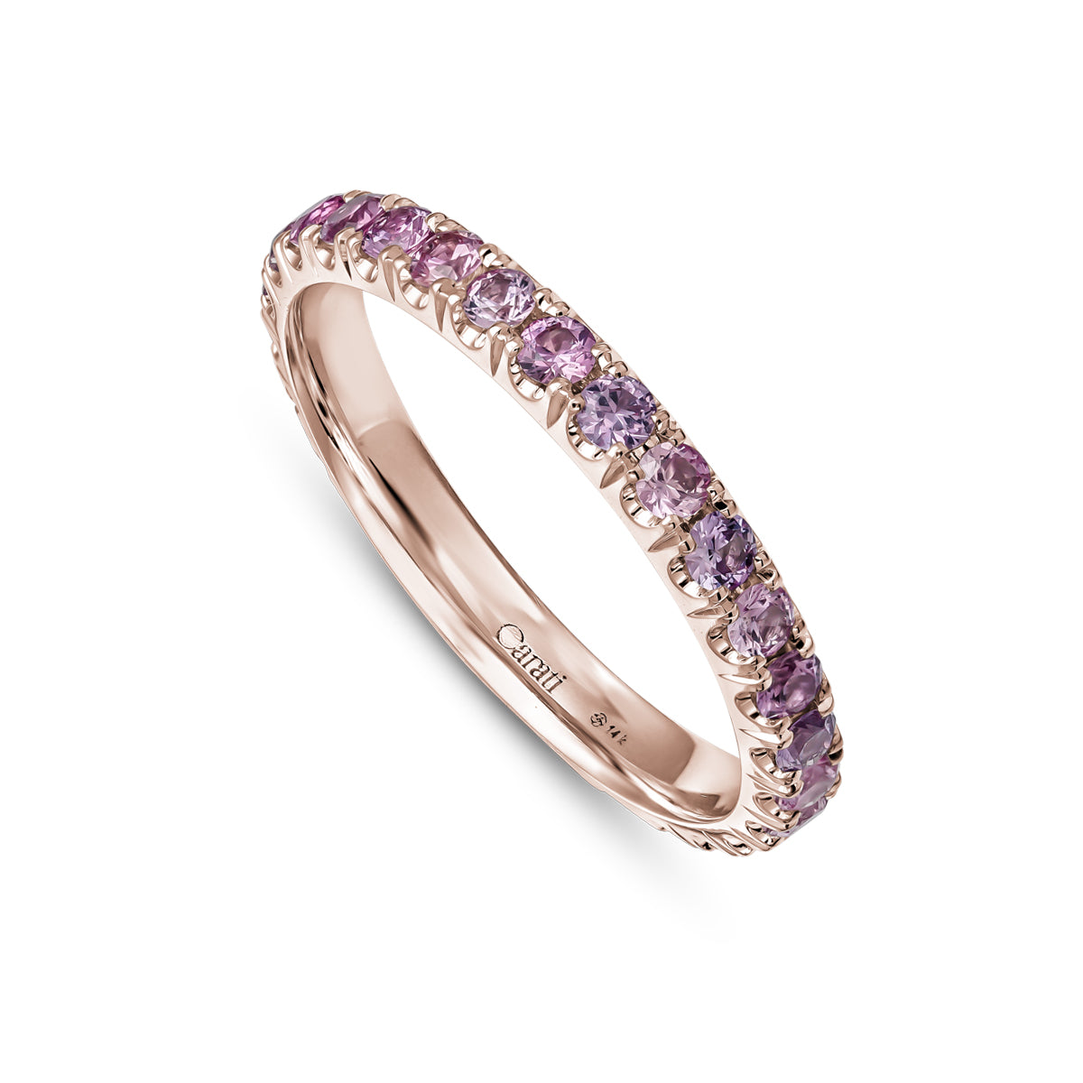 A gold engagement ring set with pink sapphires, featuring intricate hand-engraved details.hand made montreal 14 k 18 k