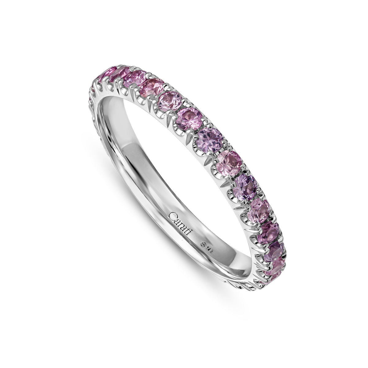 A gold engagement ring set with pink sapphires, featuring intricate hand-engraved details.hand made montreal 14 k 18 k