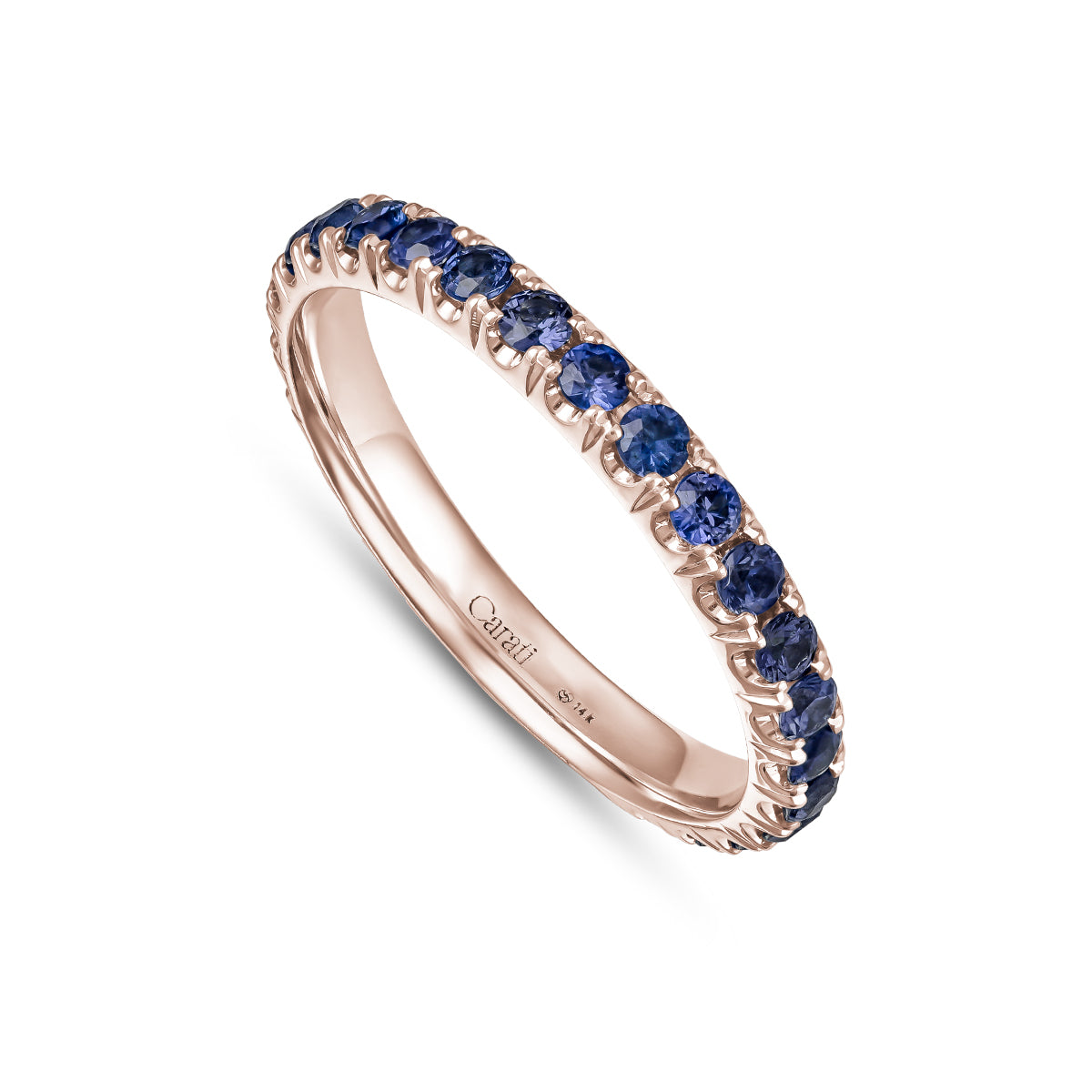 A gold engagement ring set with purple sapphires, featuring intricate hand-engraved details.hand made montreal 14 k 18 k