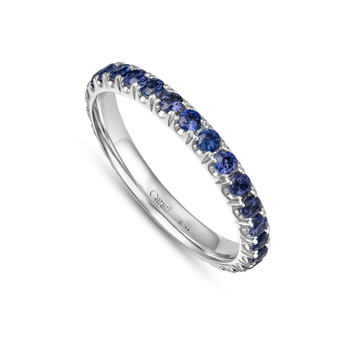 A gold engagement ring set with purple sapphires, featuring intricate hand-engraved details.hand made montreal 14 k 18 k