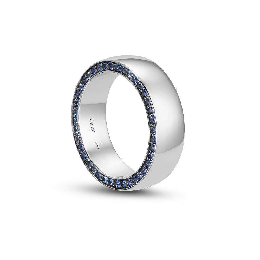 14 and 18 k wedding band in white gold with pave set in blue sapphires
designed by carati jewelry montreal